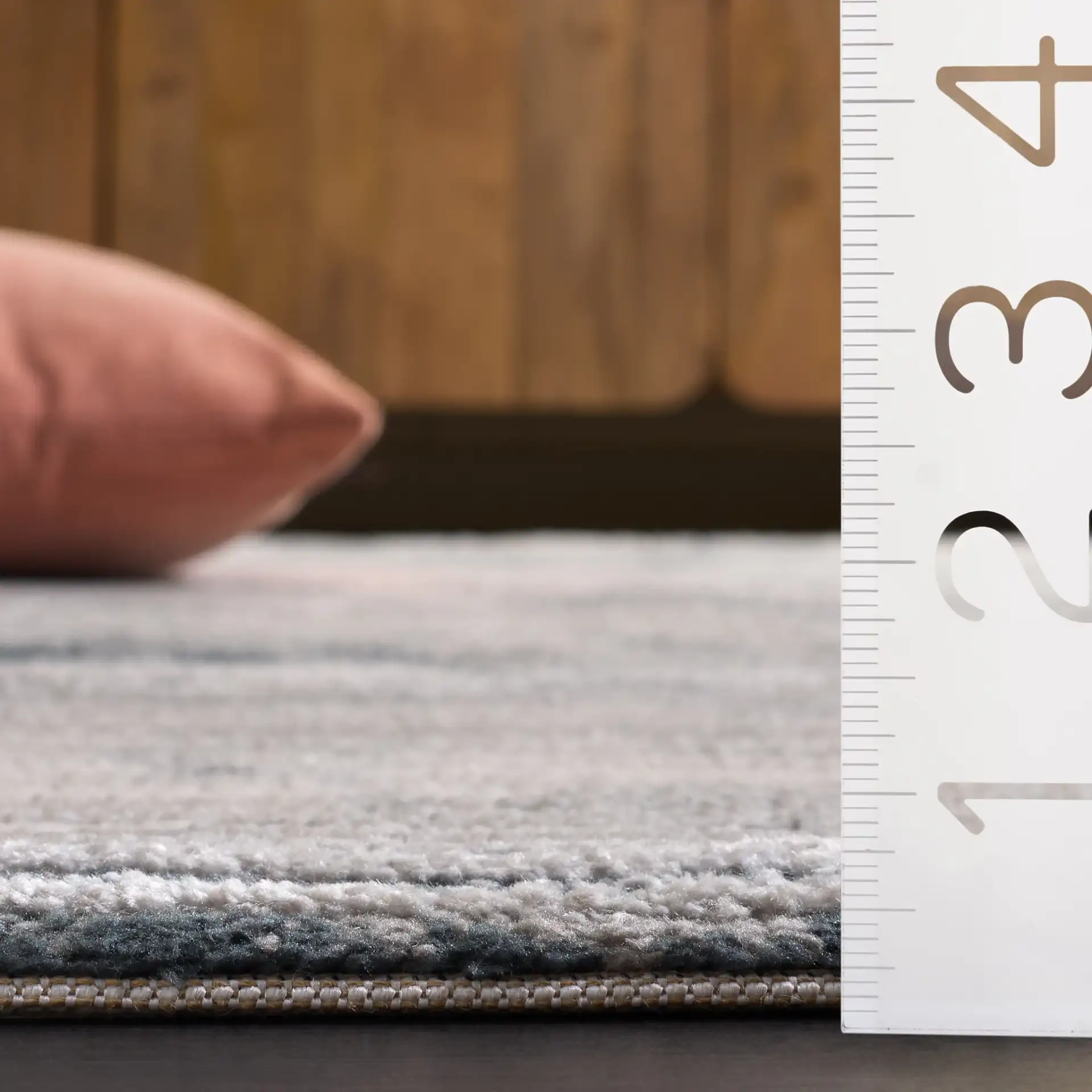 Lunara Modern Striated Rug in Ivory / Blue in a styled room