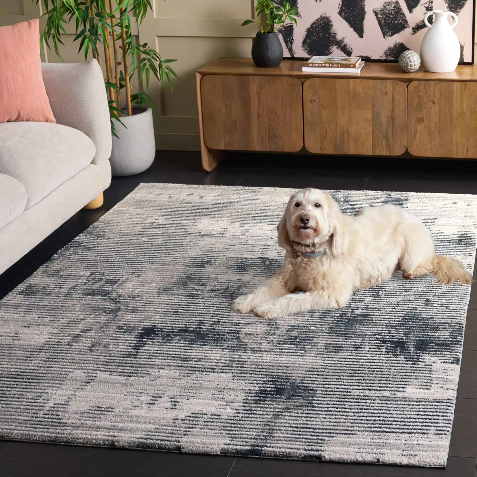 Lunara Modern Striated Rug in Ivory / Blue in a styled room