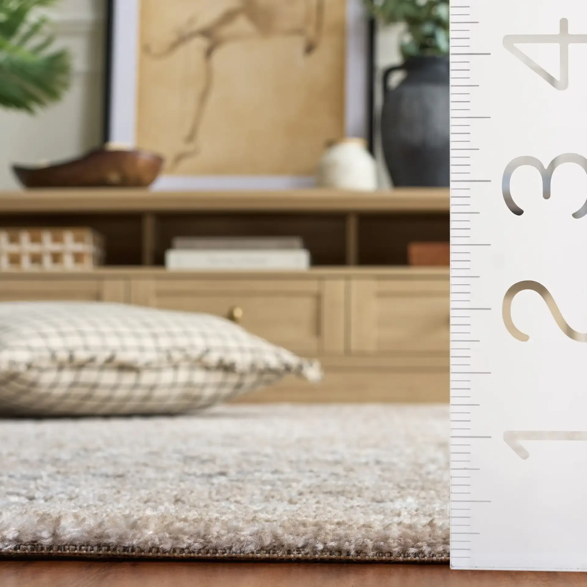 Lunara Transitional Damask Rug in Gray / Beige in a styled room