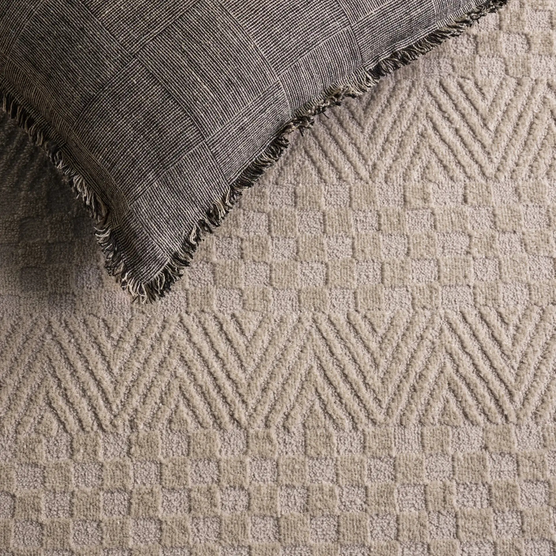 Lunara Modern Chevron Rug in Beige / Light Beige in a styled room