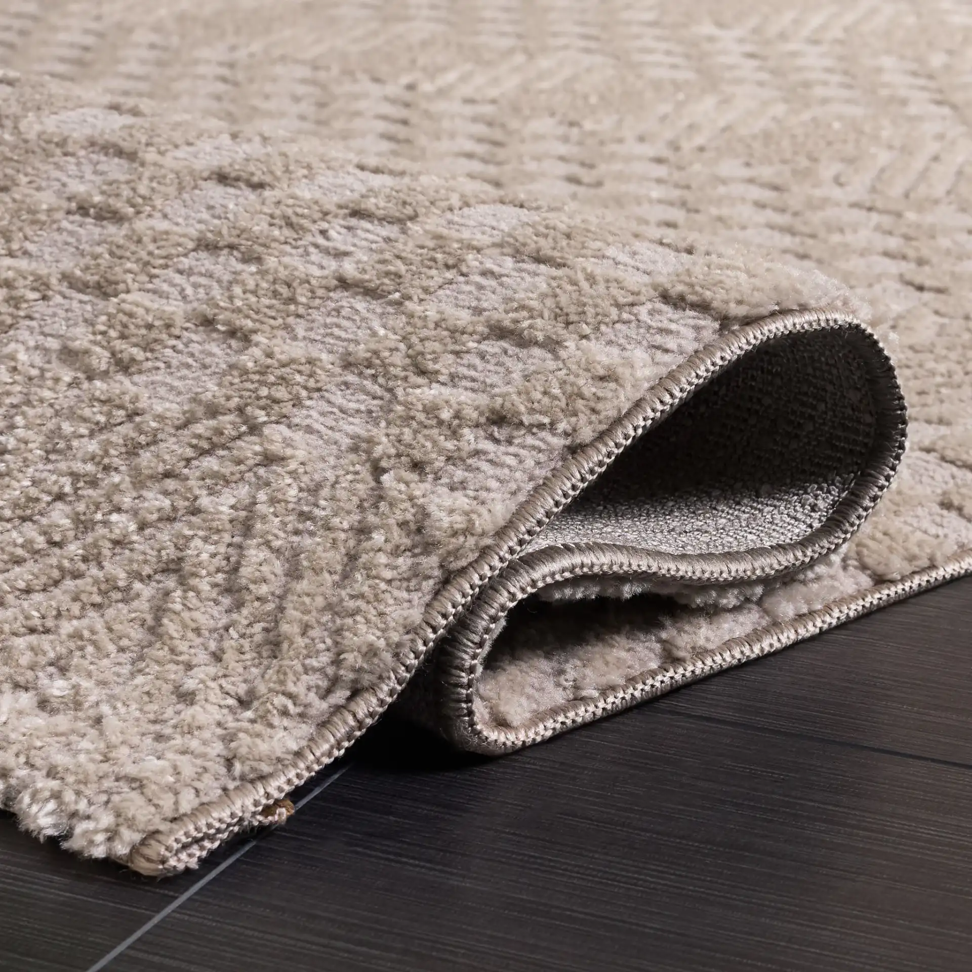 Lunara Modern Chevron Rug in Beige / Light Beige in a styled room
