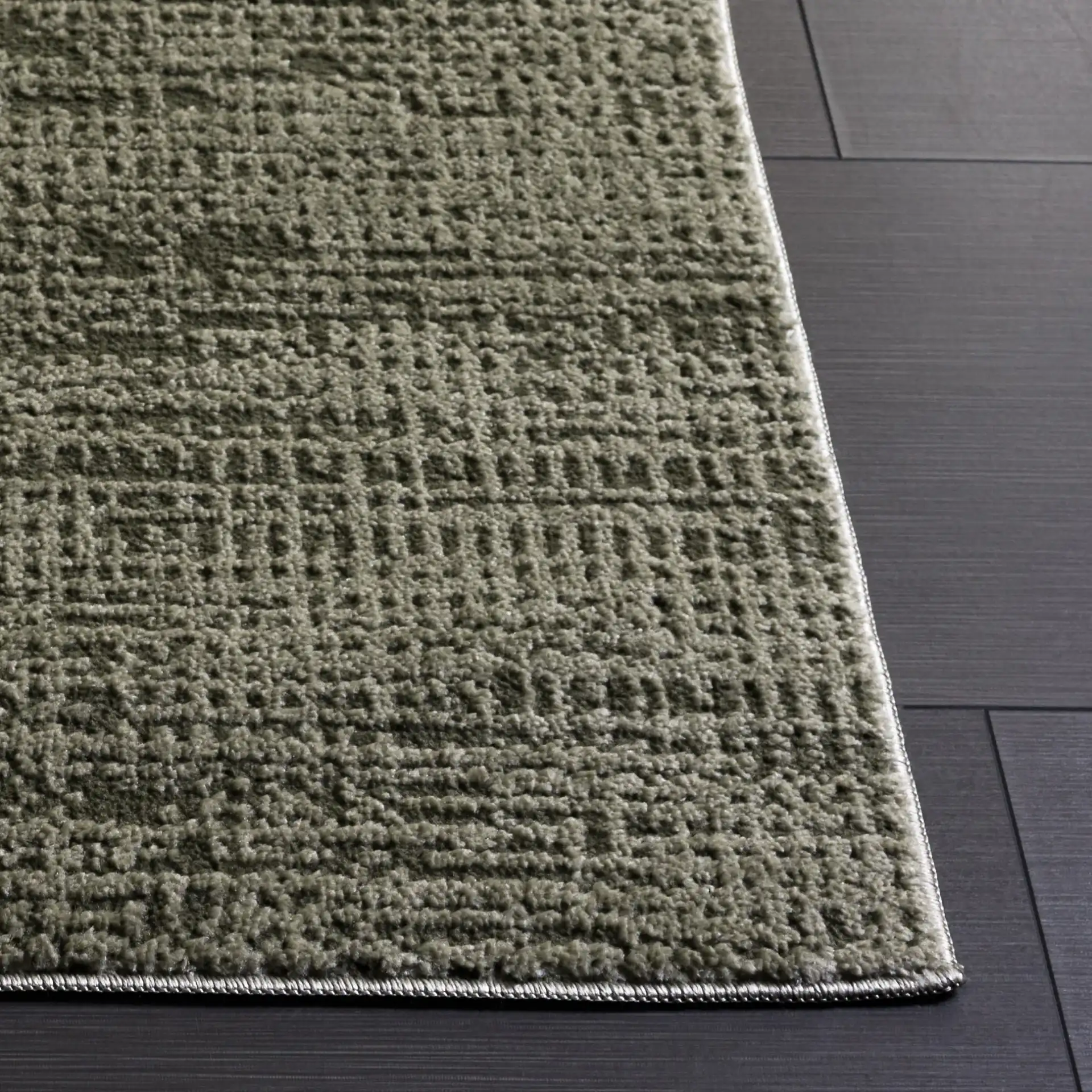 Lunara Modern Ribbed Rug in Green / Dark Green in a styled room