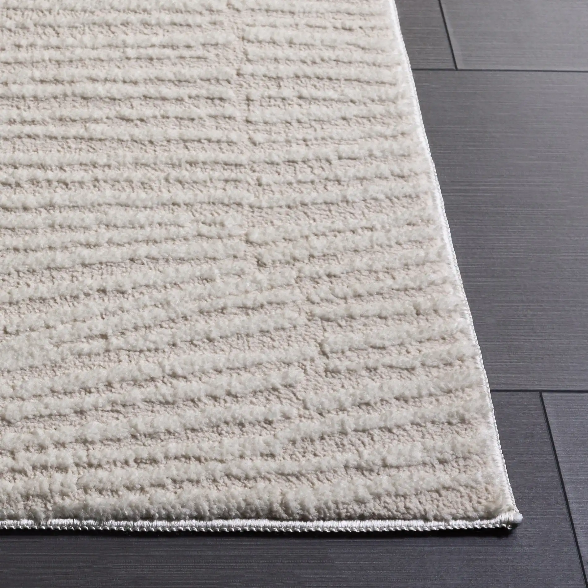Lunara Modern Ribbed Rug in Ivory in a styled room