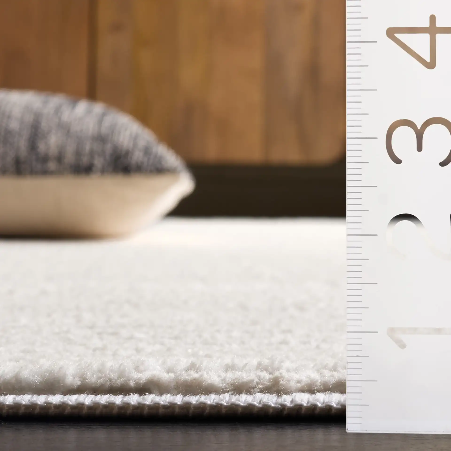 Lunara Modern Ribbed Rug in Ivory in a styled room