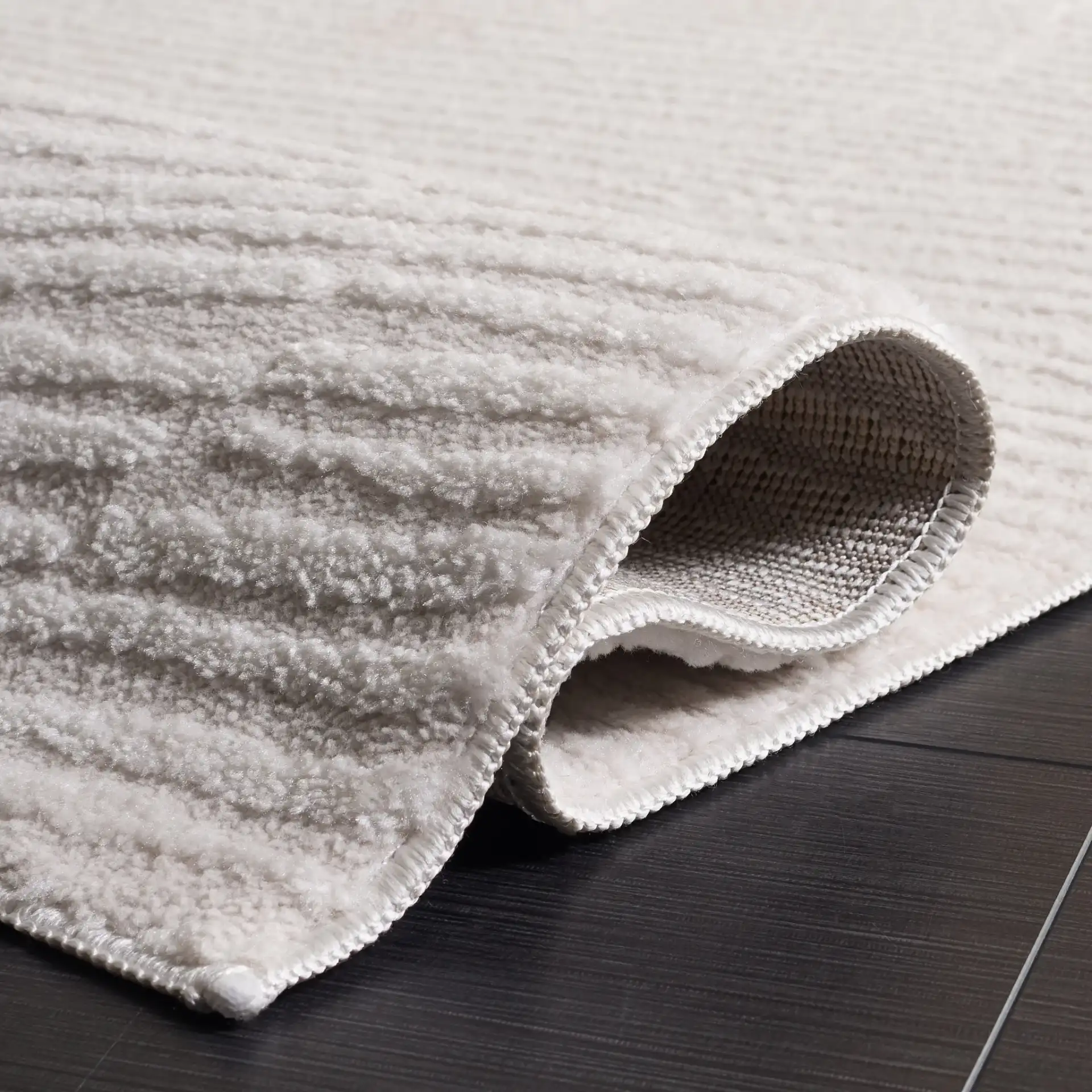 Lunara Modern Ribbed Rug in Ivory in a styled room