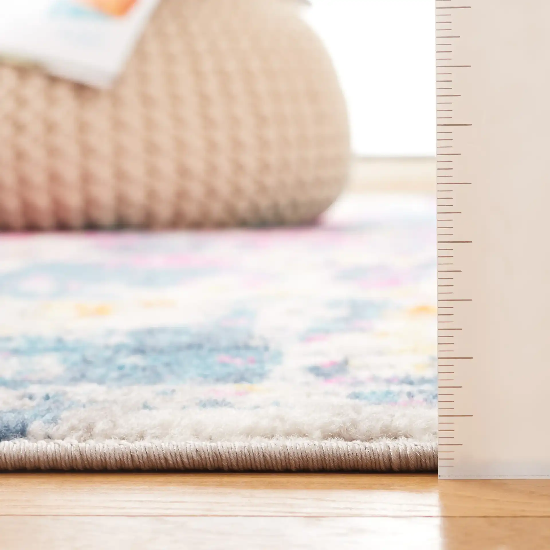 Madison Abstract Grid Rug in Ivory / Blue in a styled room