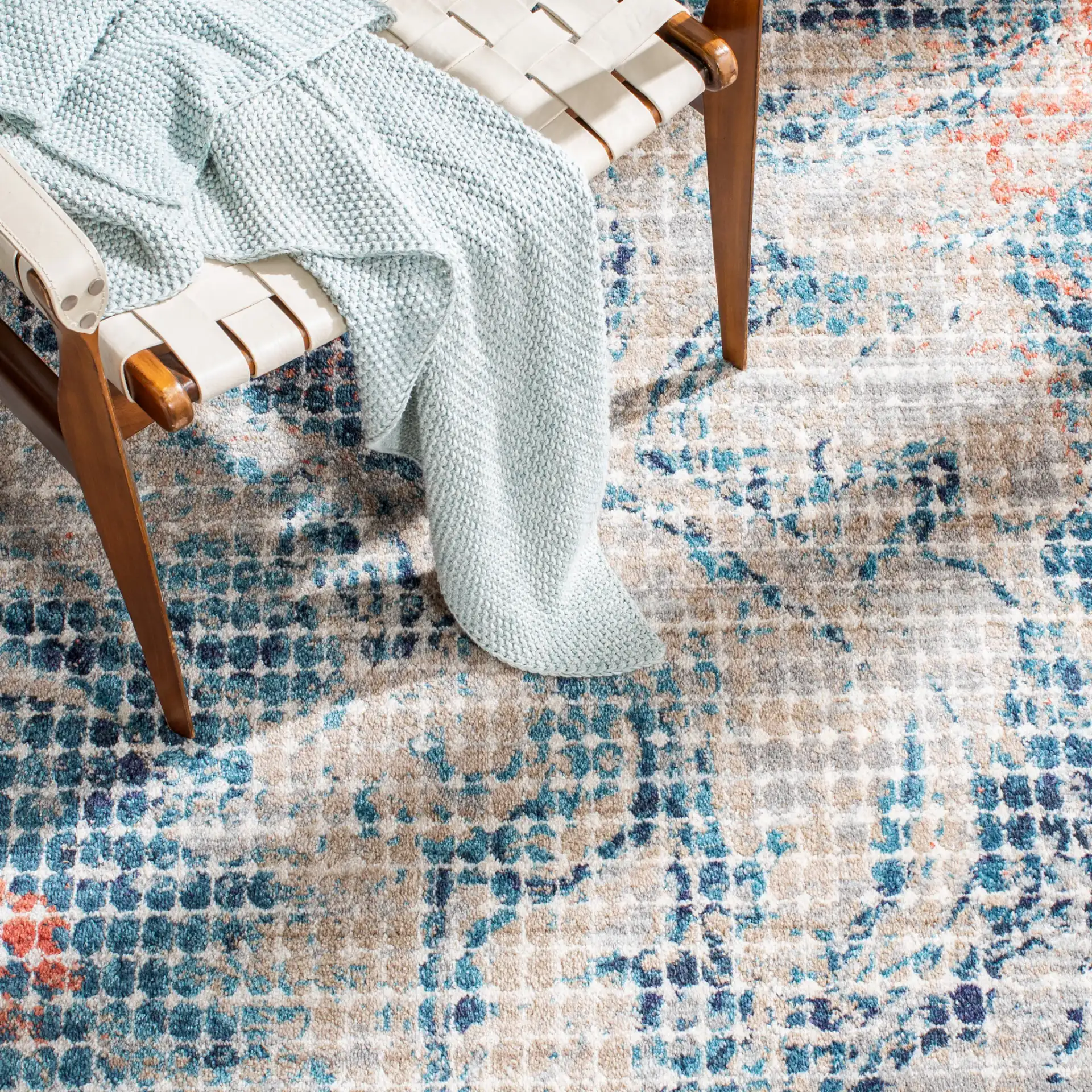 Madison Modernist Abstract Dotted Rug in Gray / Blue in a styled room
