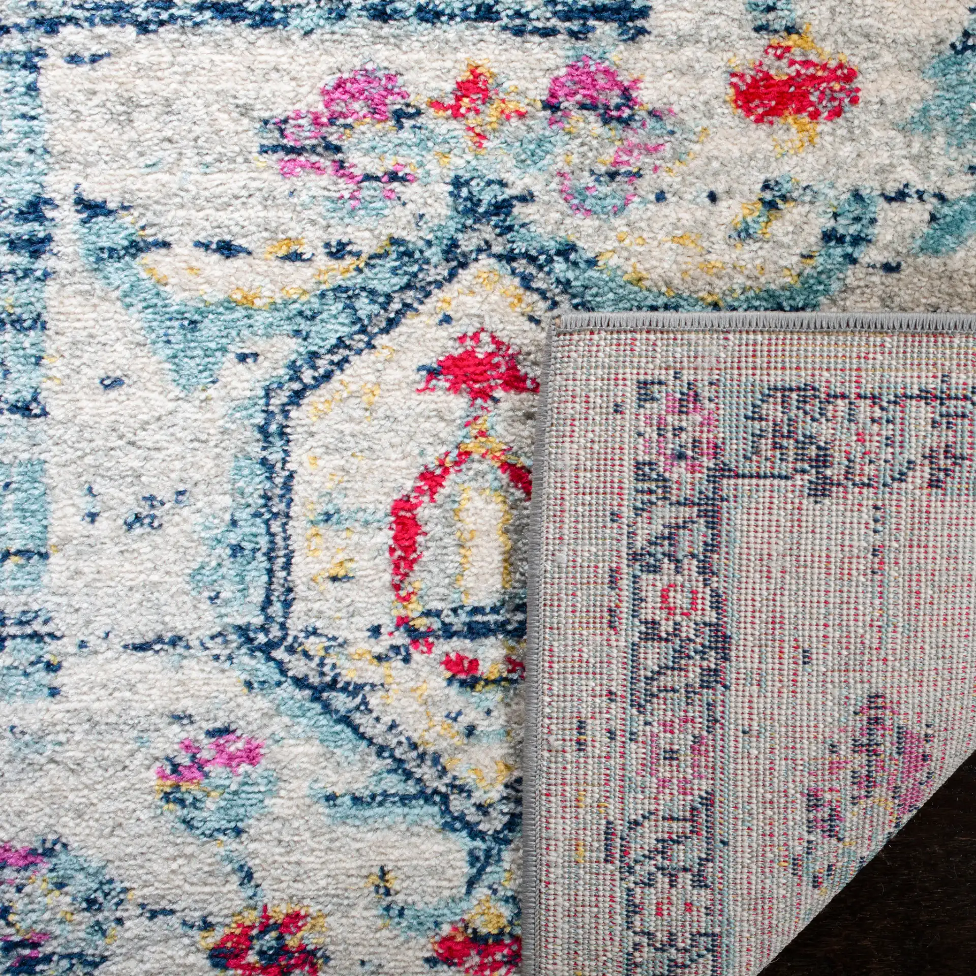 Madison Transitional Geometric Medallion Rug in Light Gray / Fuchsia in a styled room