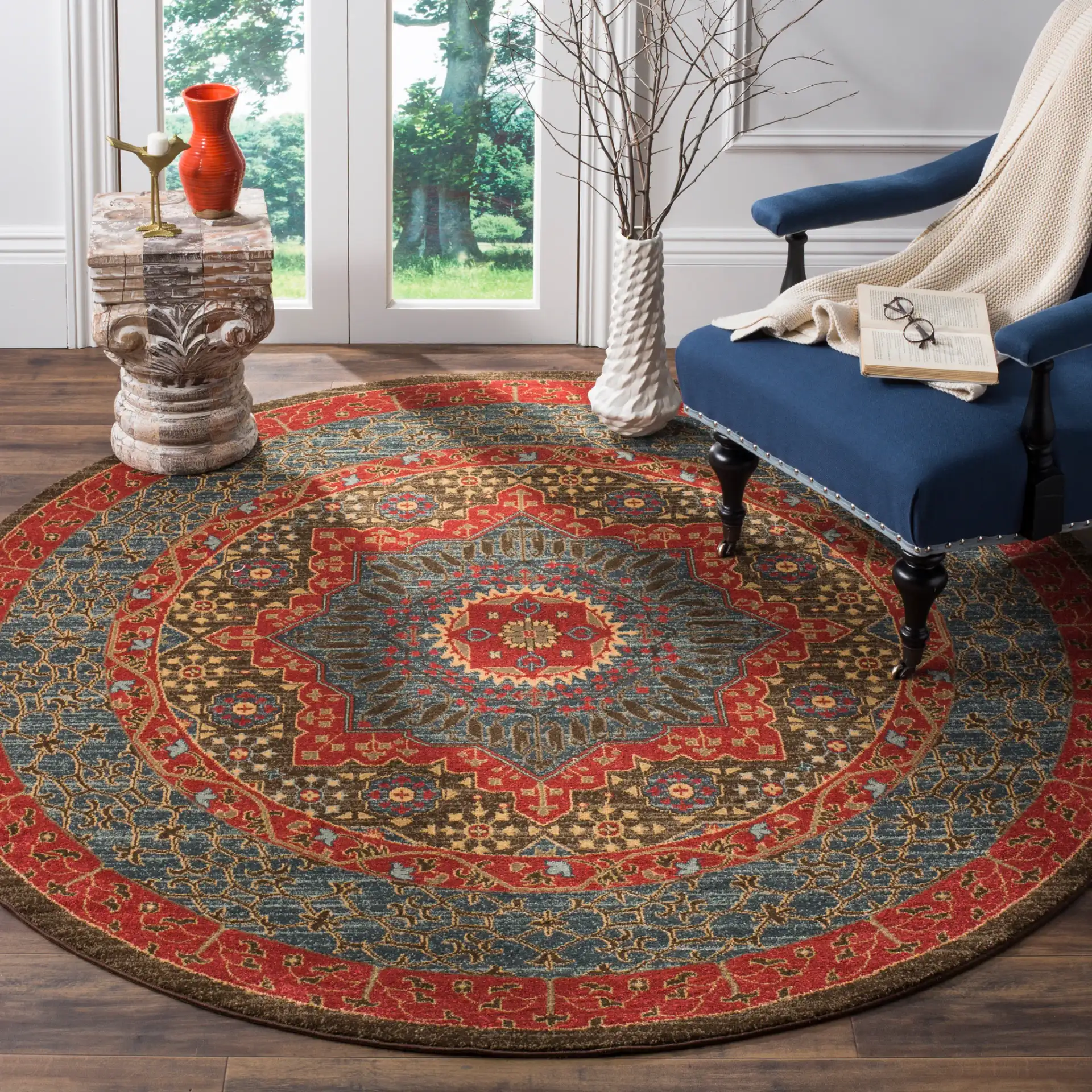 Mahal Medallion Rug in Navy / Red in a styled room