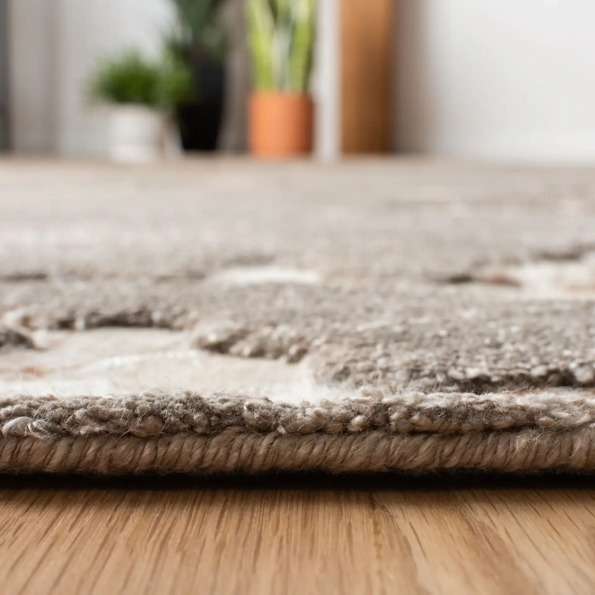 Manhattan Hexagon Hand-Tufted Rug in Taupe in a styled room