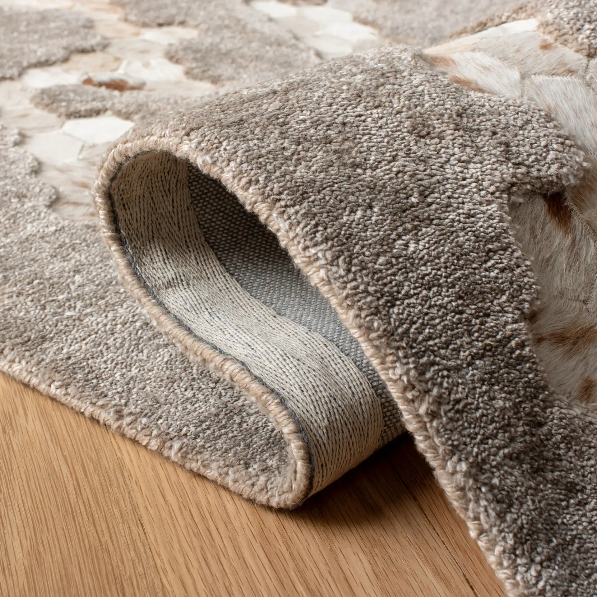 Manhattan Hexagon Hand-Tufted Rug in Taupe in a styled room