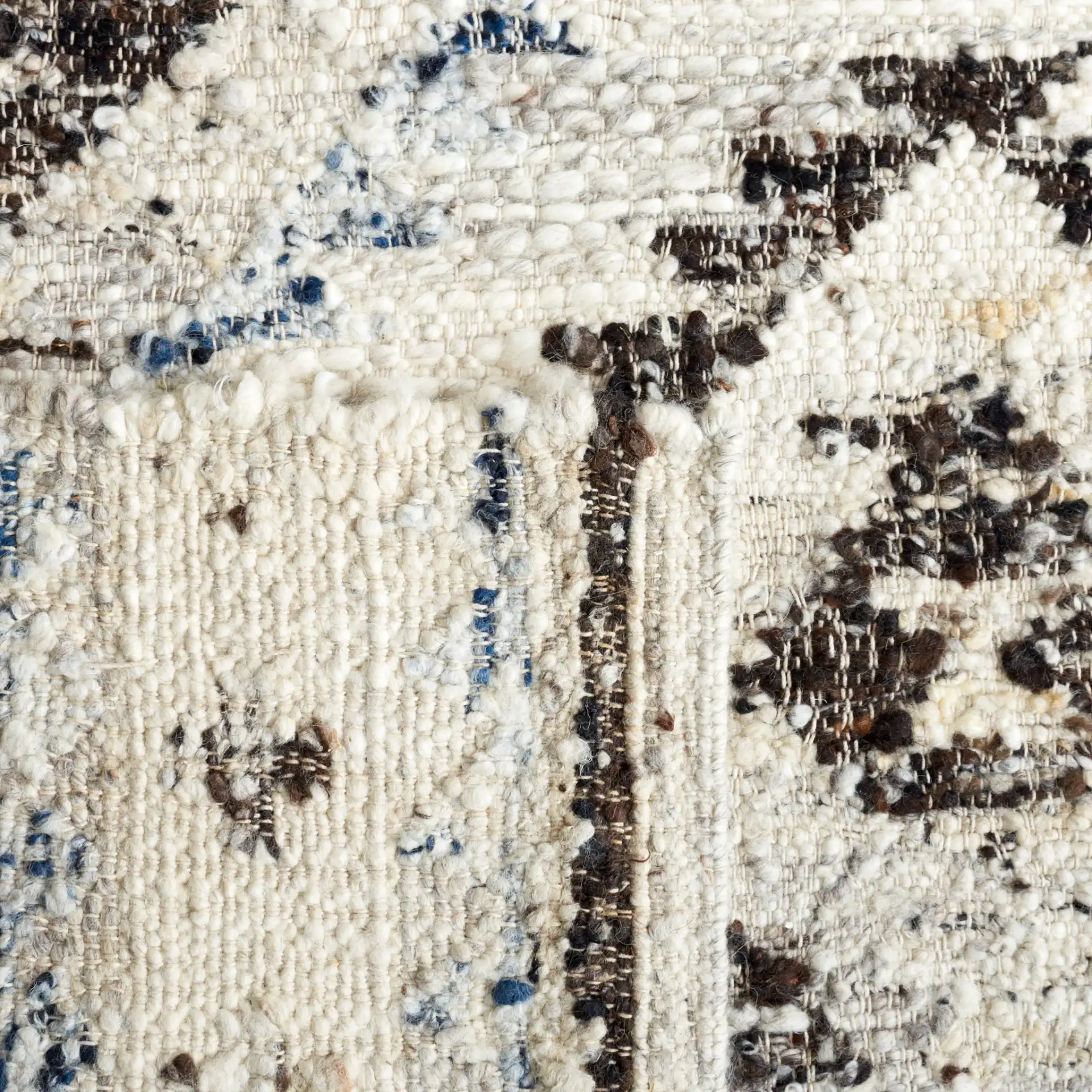 Manhattan Tribal Diamond Hand-Woven Wool Rug in Ivory / Charcoal in a styled room