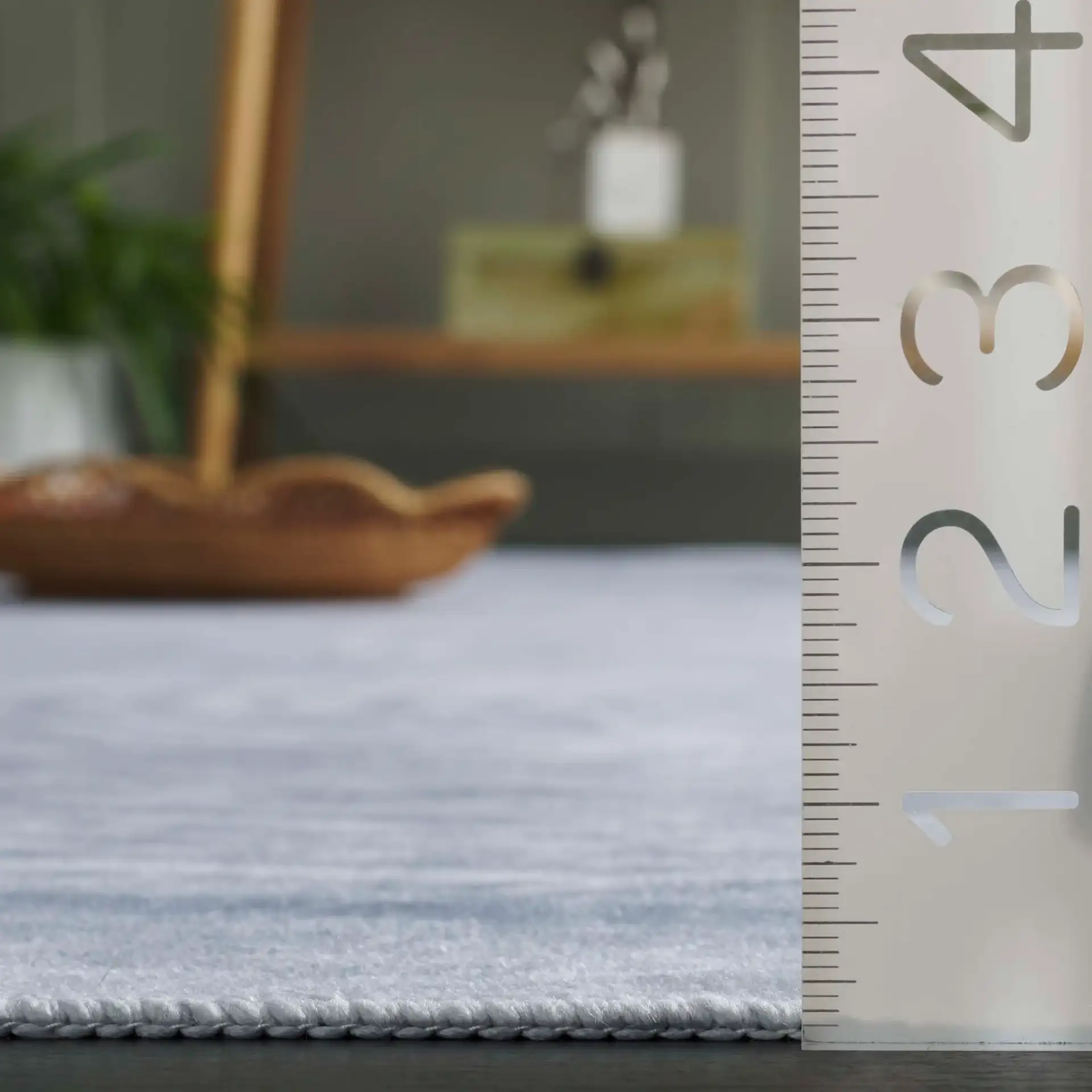 Malibu Ripple Washable Rug in Gray in a styled room