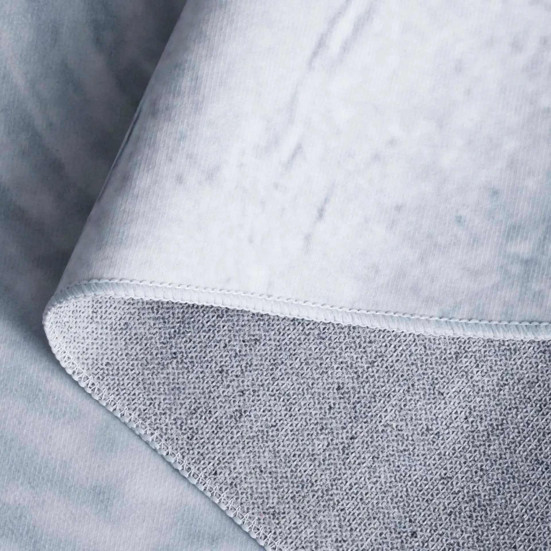 Malibu Ripple Washable Rug in Gray in a styled room