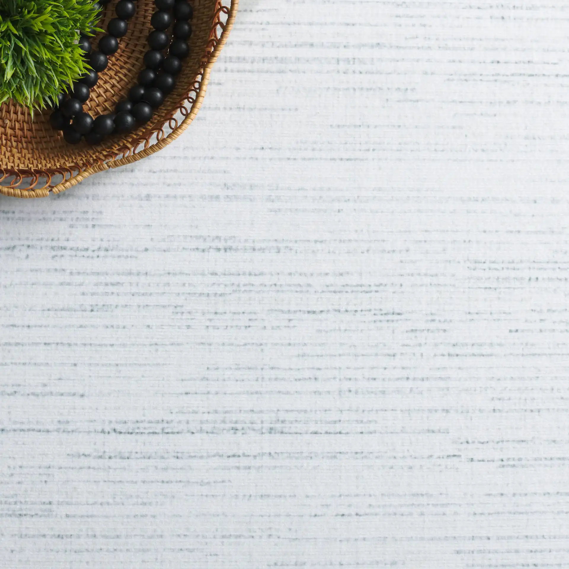 Malibu Striped Border Washable Rug in Ivory / Gray in a styled room