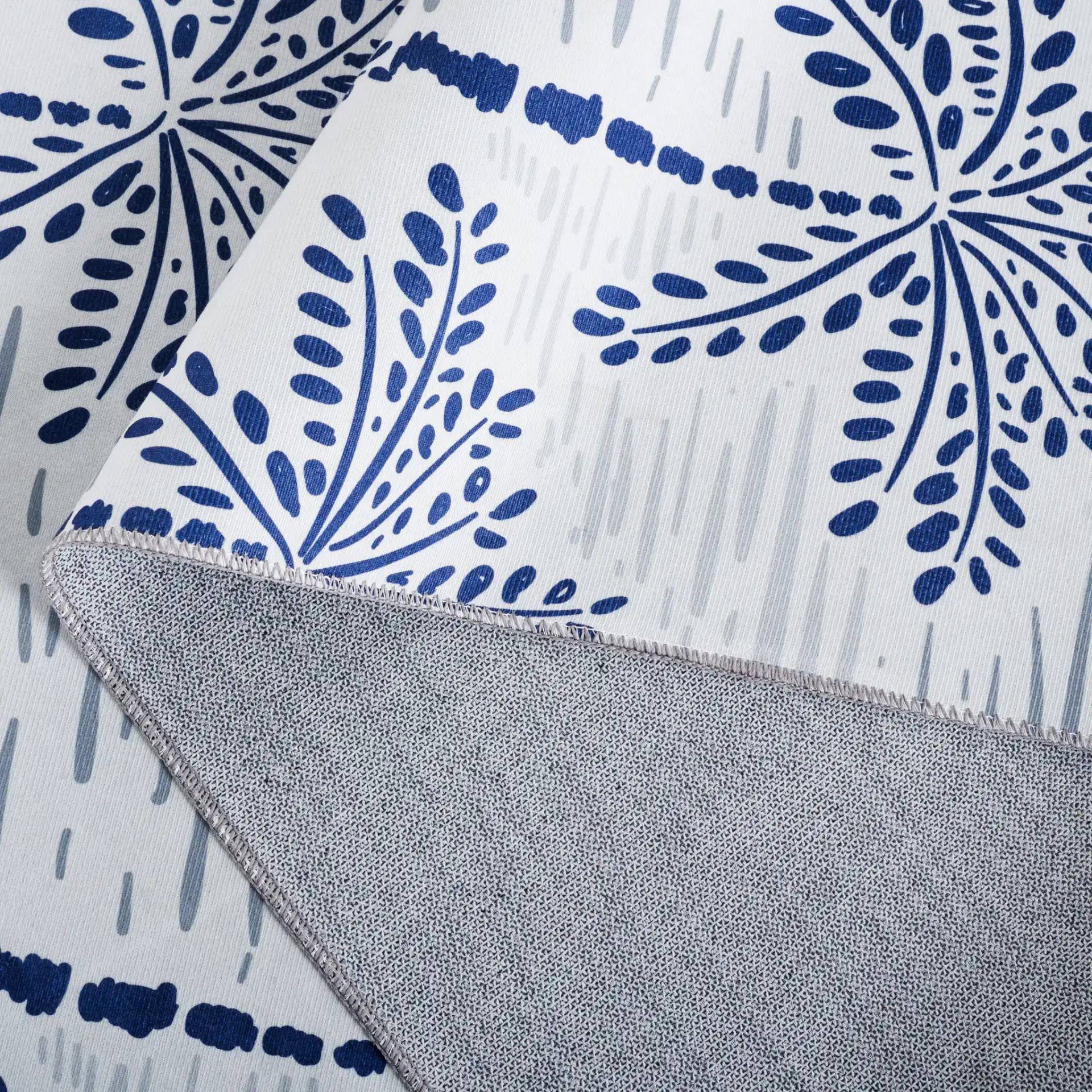 Malibu Palm Tree Washable Rug in Ivory / Navy in a styled room