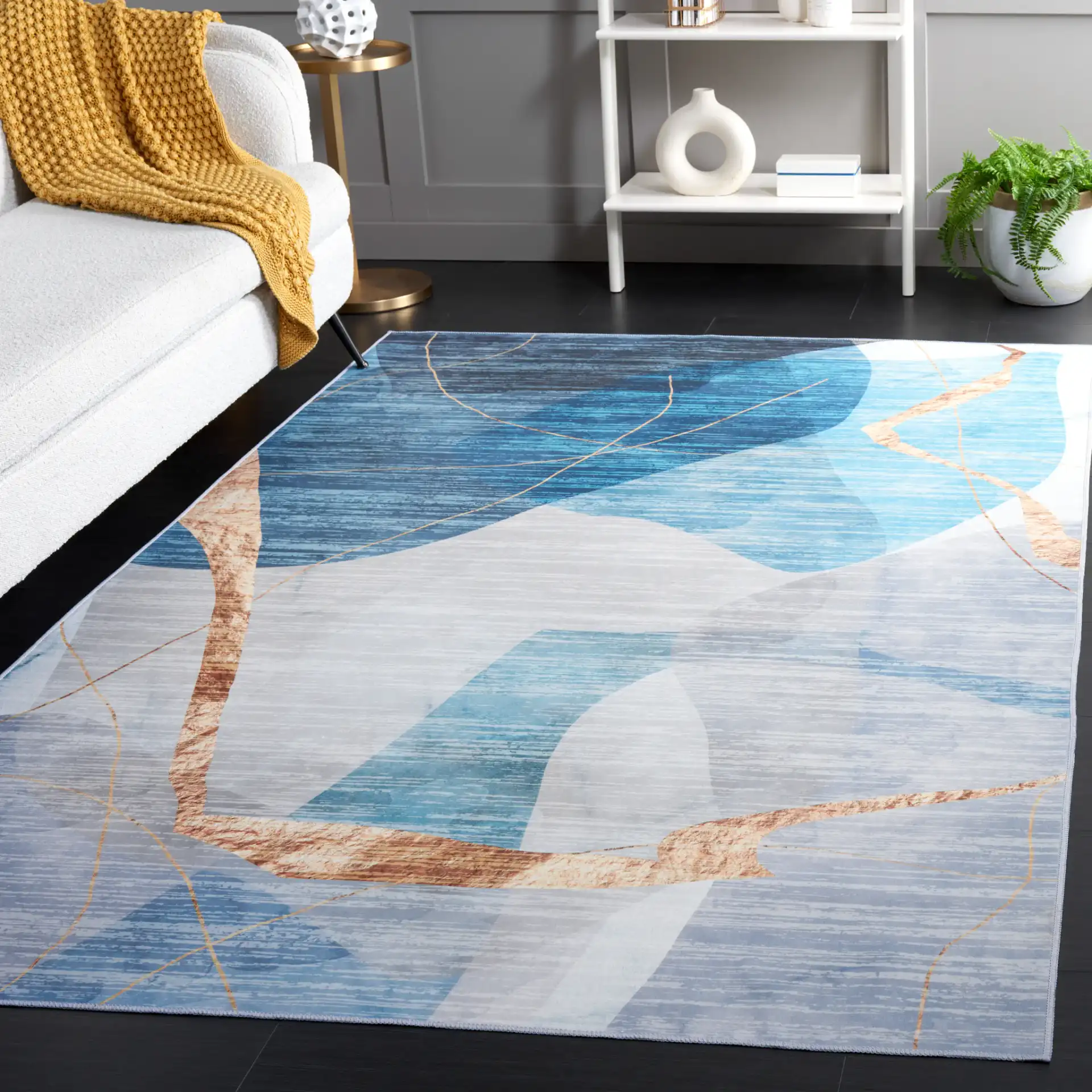 Malibu Modern Abstract Washable Rug in Blue / Gold in a styled room
