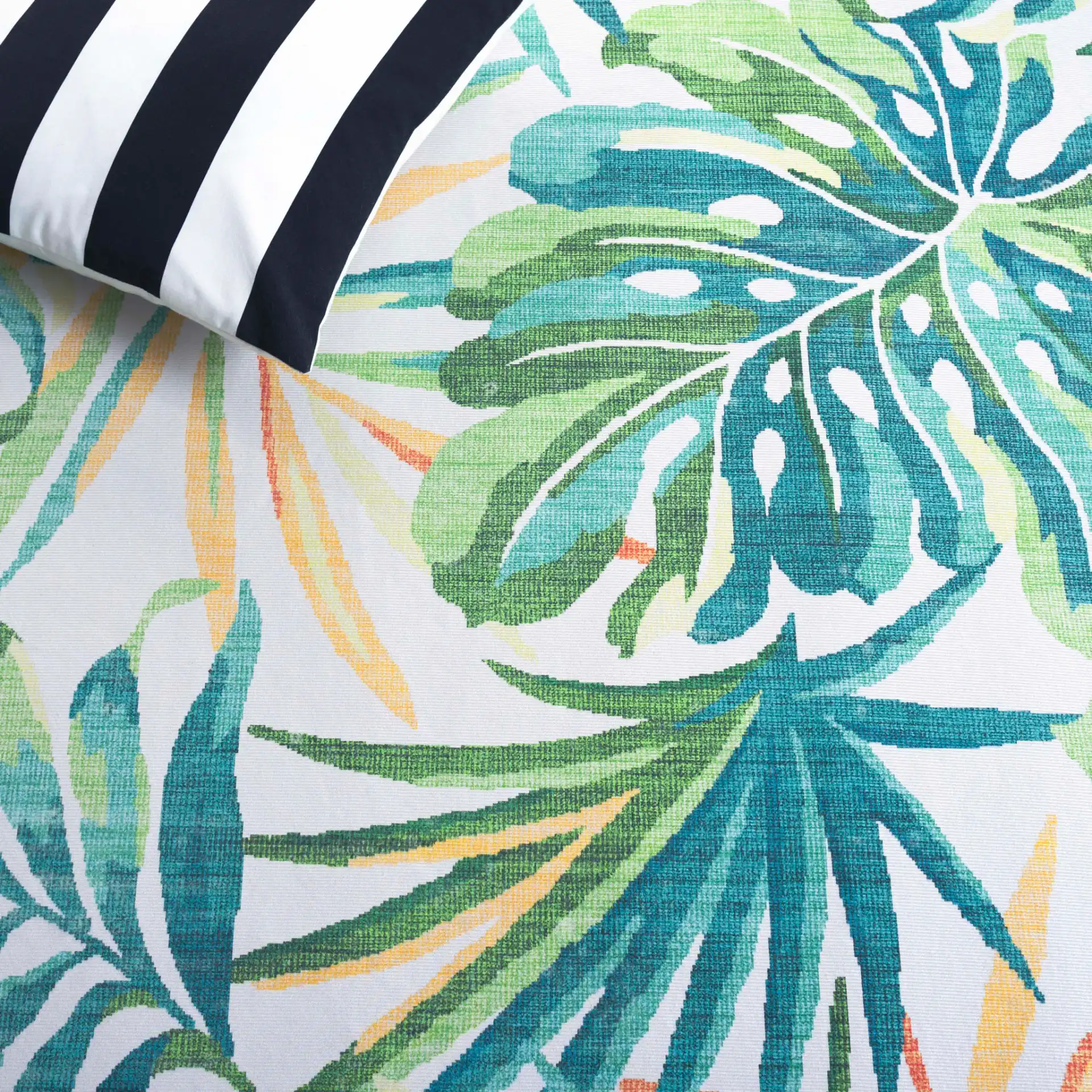 Malibu Tropical Palm Washable Rug in Ivory / Green in a styled room