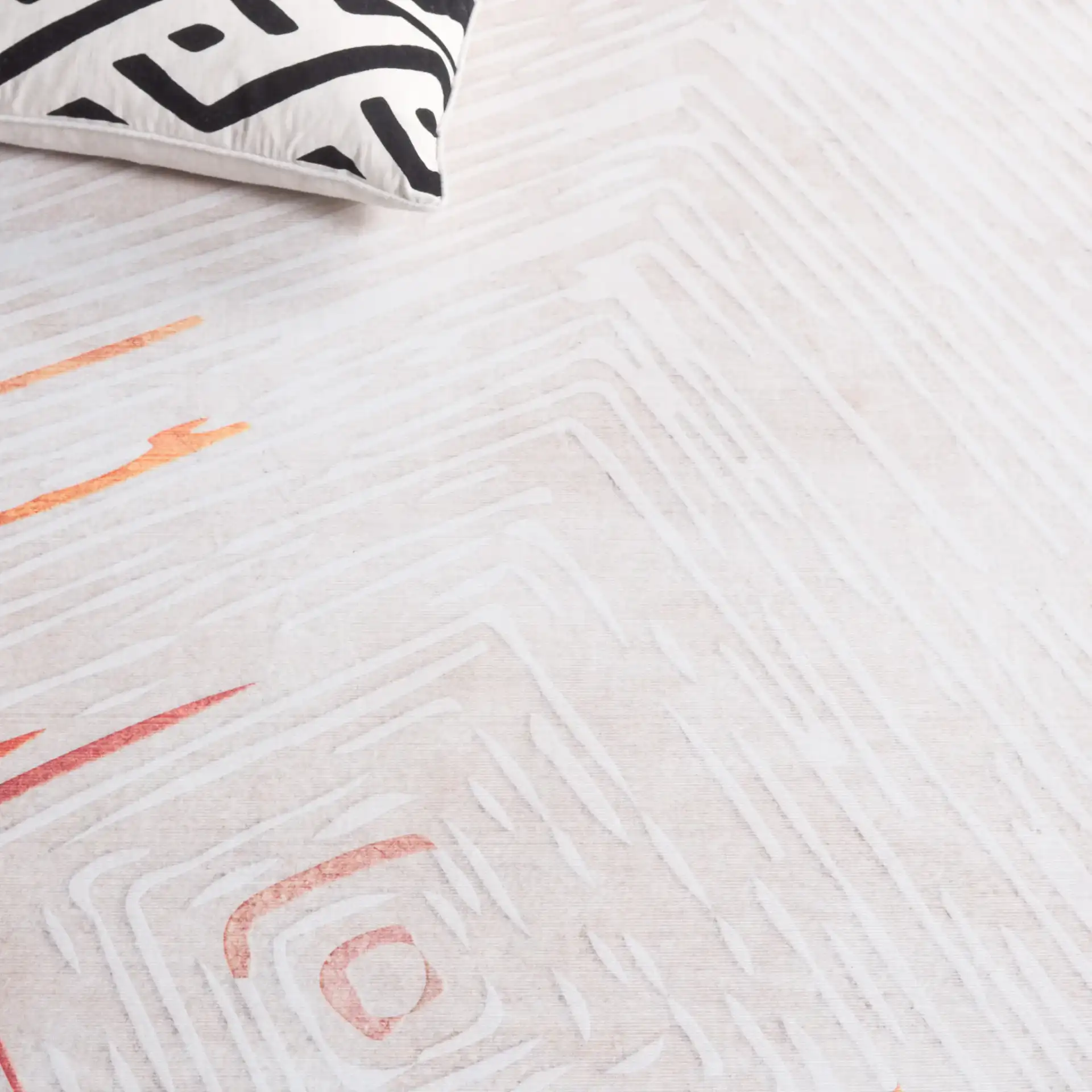 Malibu Concentric Lines Washable Rug in Beige / Rust in a styled room