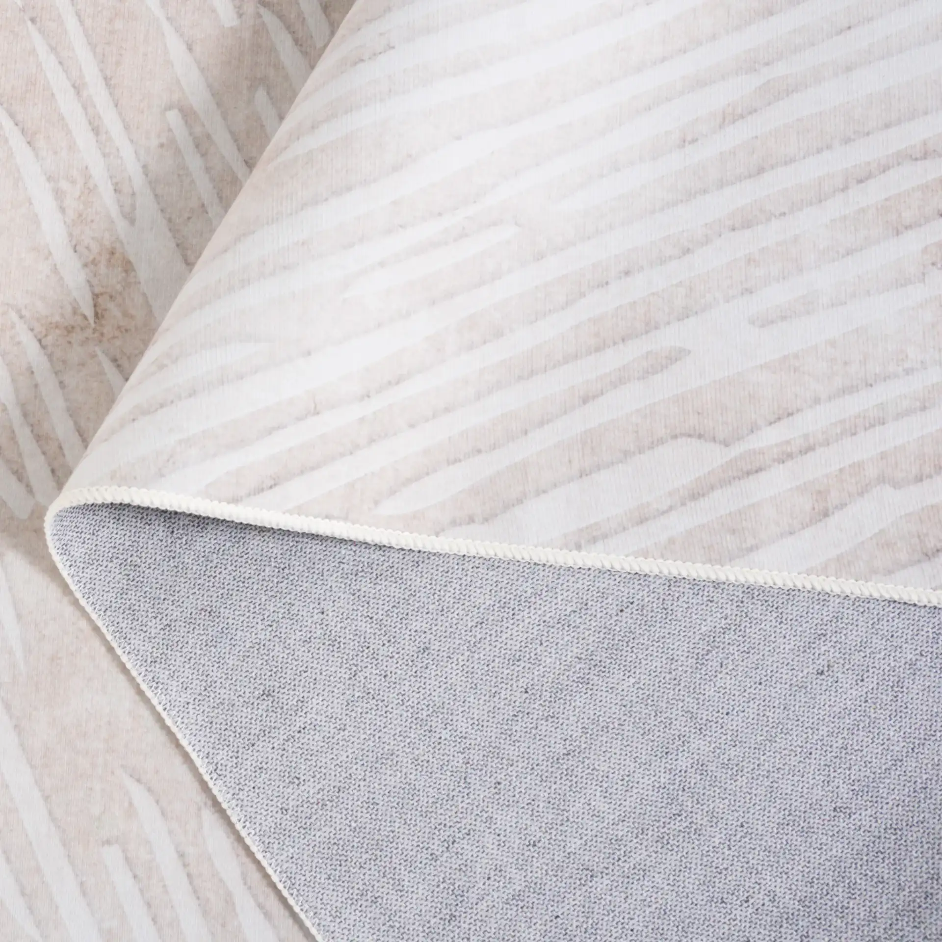 Malibu Concentric Lines Washable Rug in Beige / Rust in a styled room