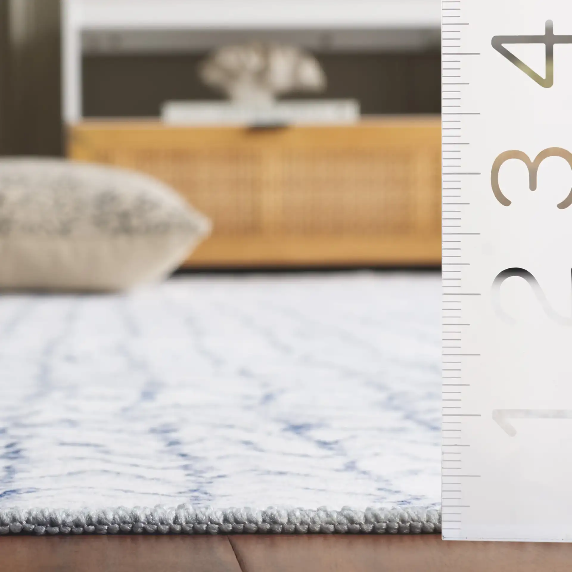 Malibu Sketched Chevron Washable Rug in Gray / Blue in a styled room