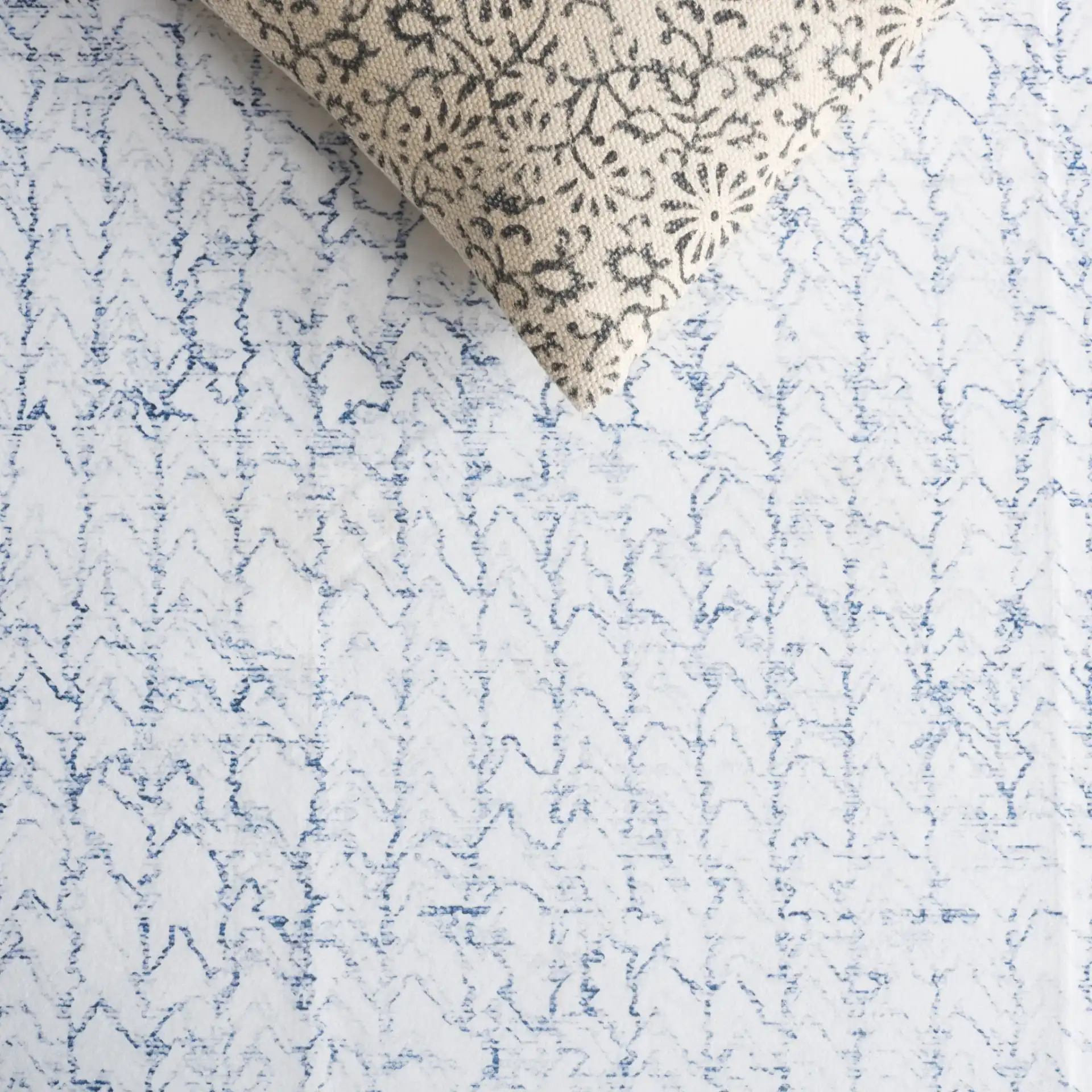 Malibu Sketched Chevron Washable Rug in Gray / Blue in a styled room