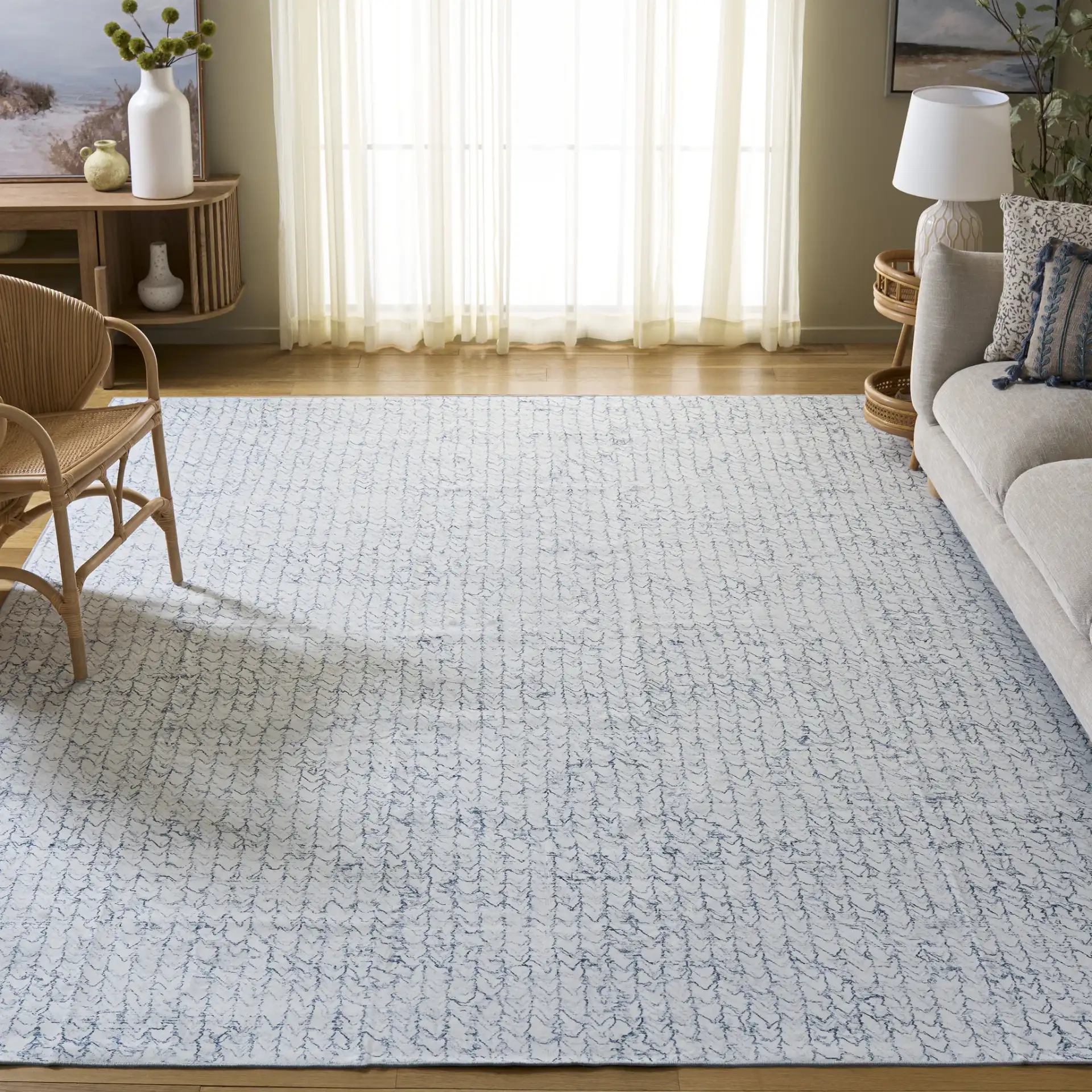 Malibu Sketched Chevron Washable Rug in Gray / Blue in a styled room