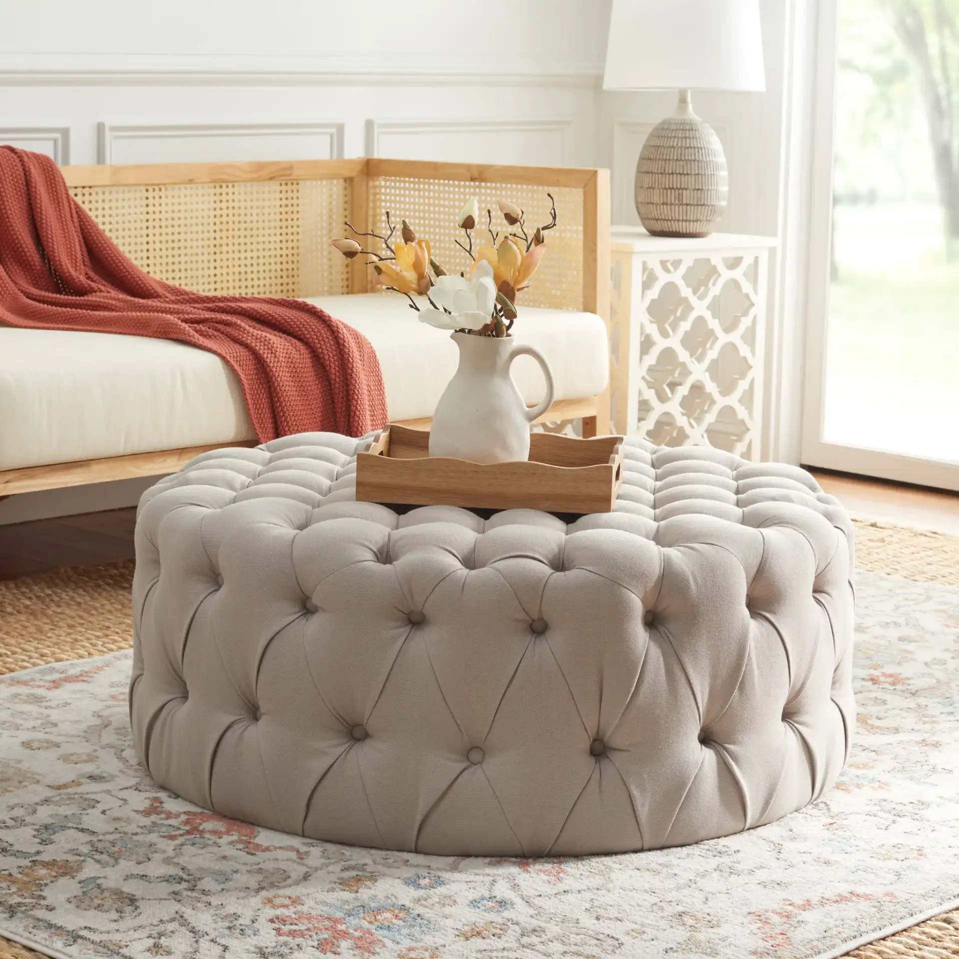 Charlene Ottoman in Taupe in a styled room