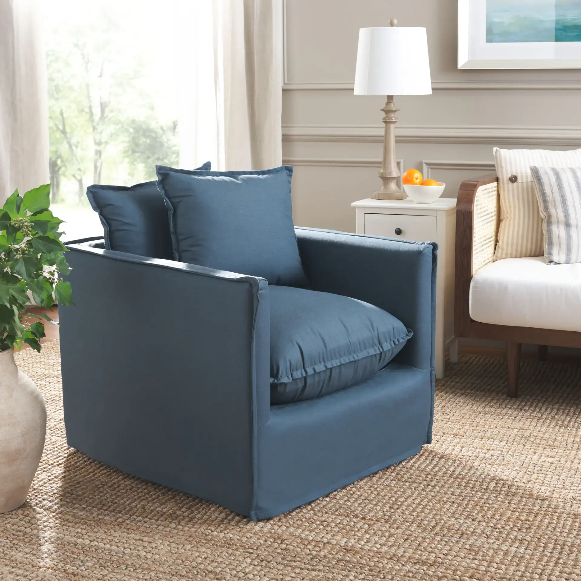 Joey Arm Chair in Blue in a styled room