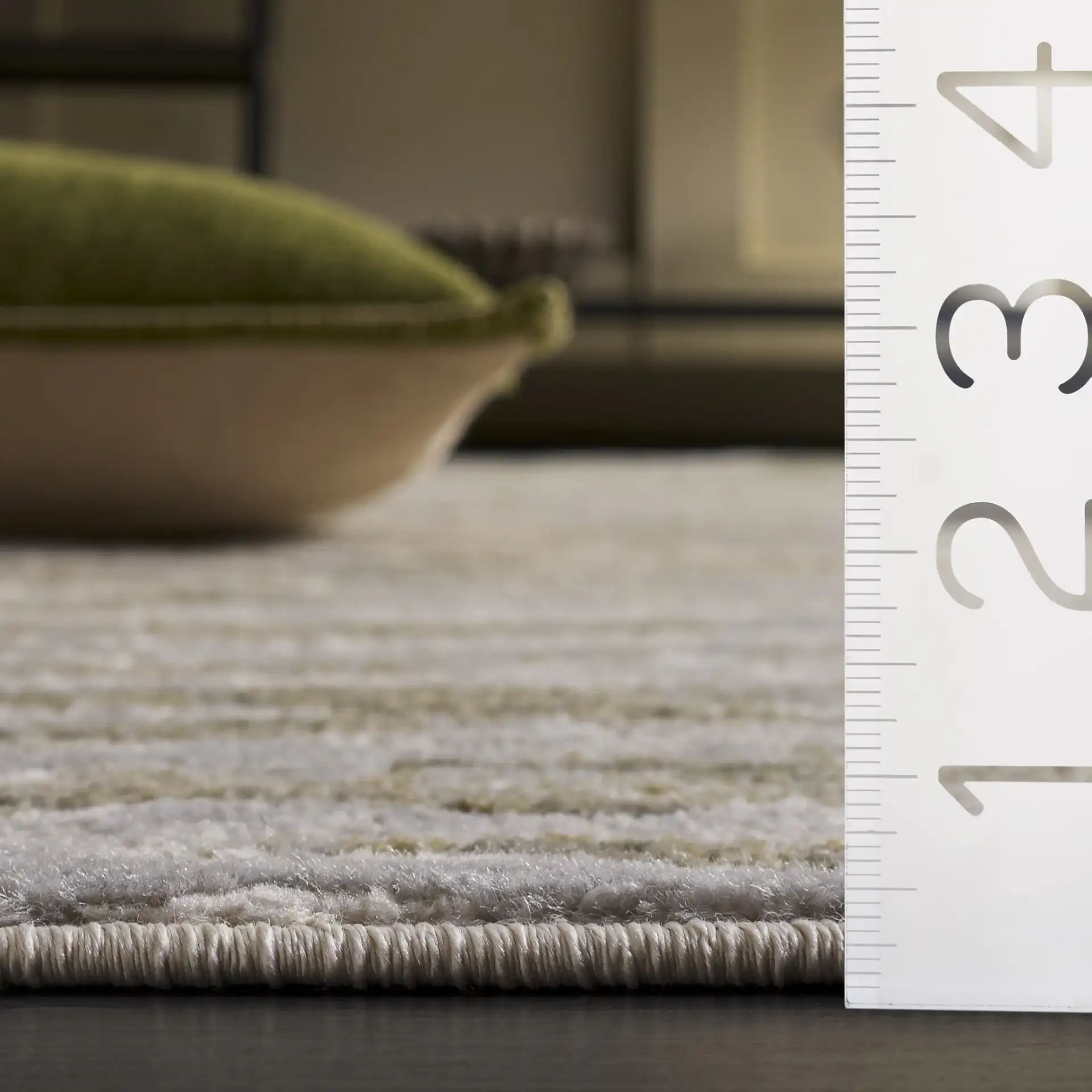 Madrid Modern Abstract Wave Rug in Gray / Green in a styled room