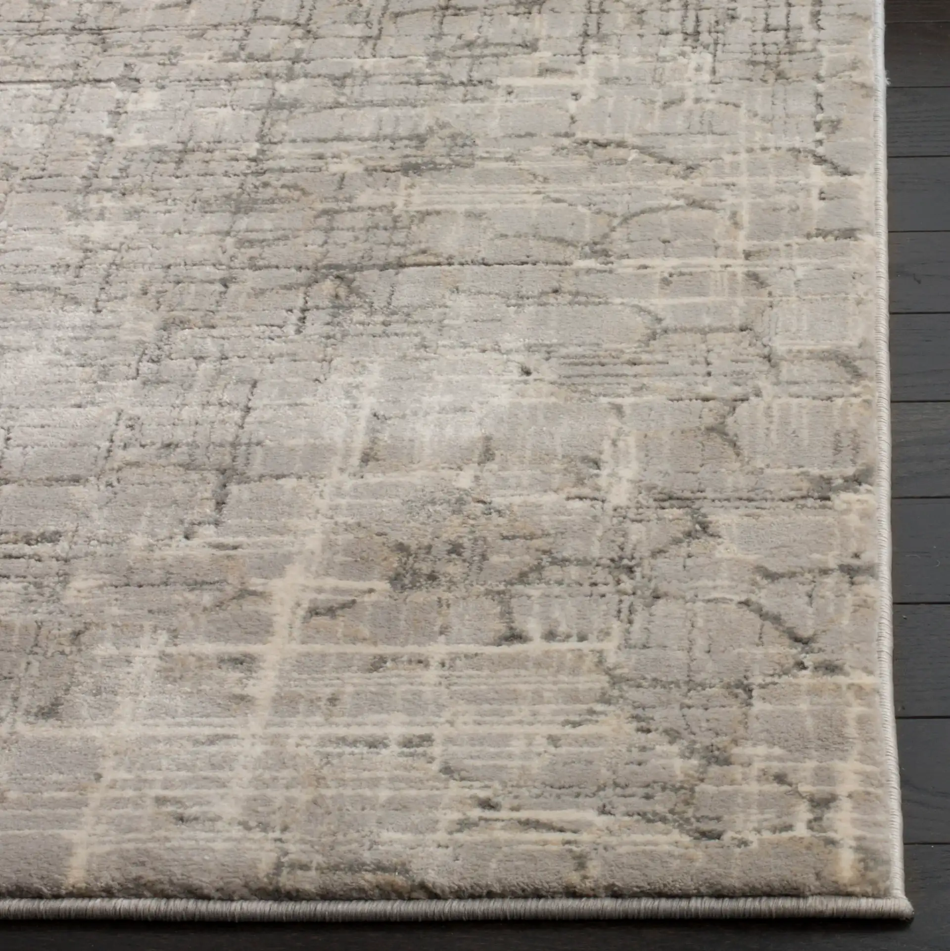 Meadow Abstract Grid Rug in Gray in a styled room
