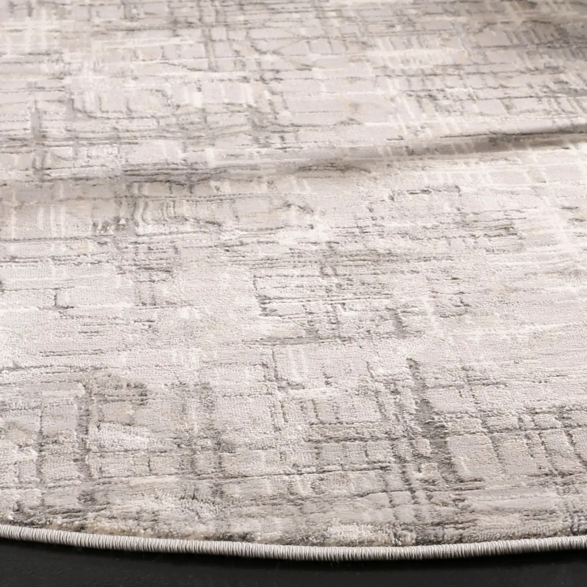 Meadow Abstract Grid Rug in Gray in a styled room