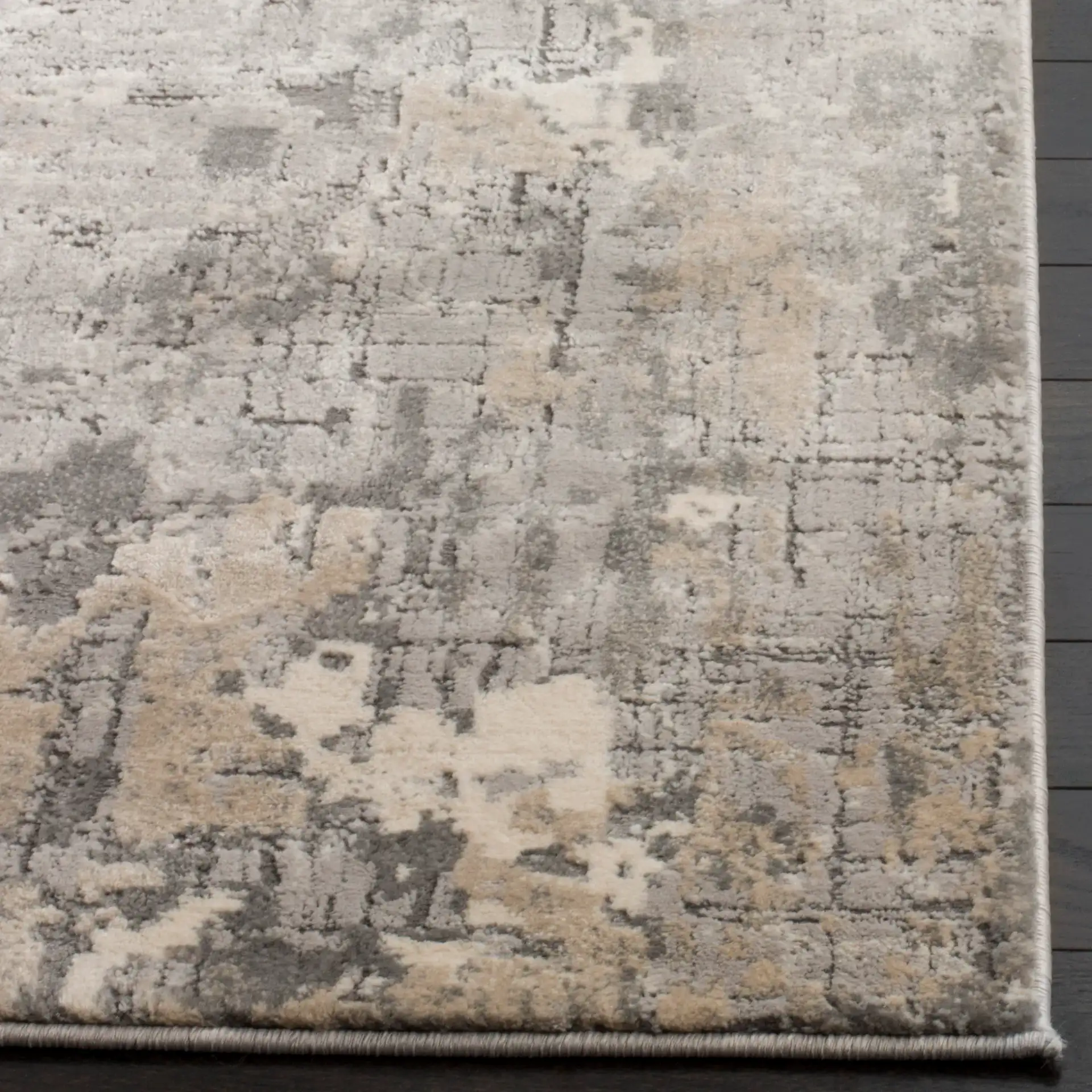 Meadow Abstract Textured Grid Rug in Gray in a styled room