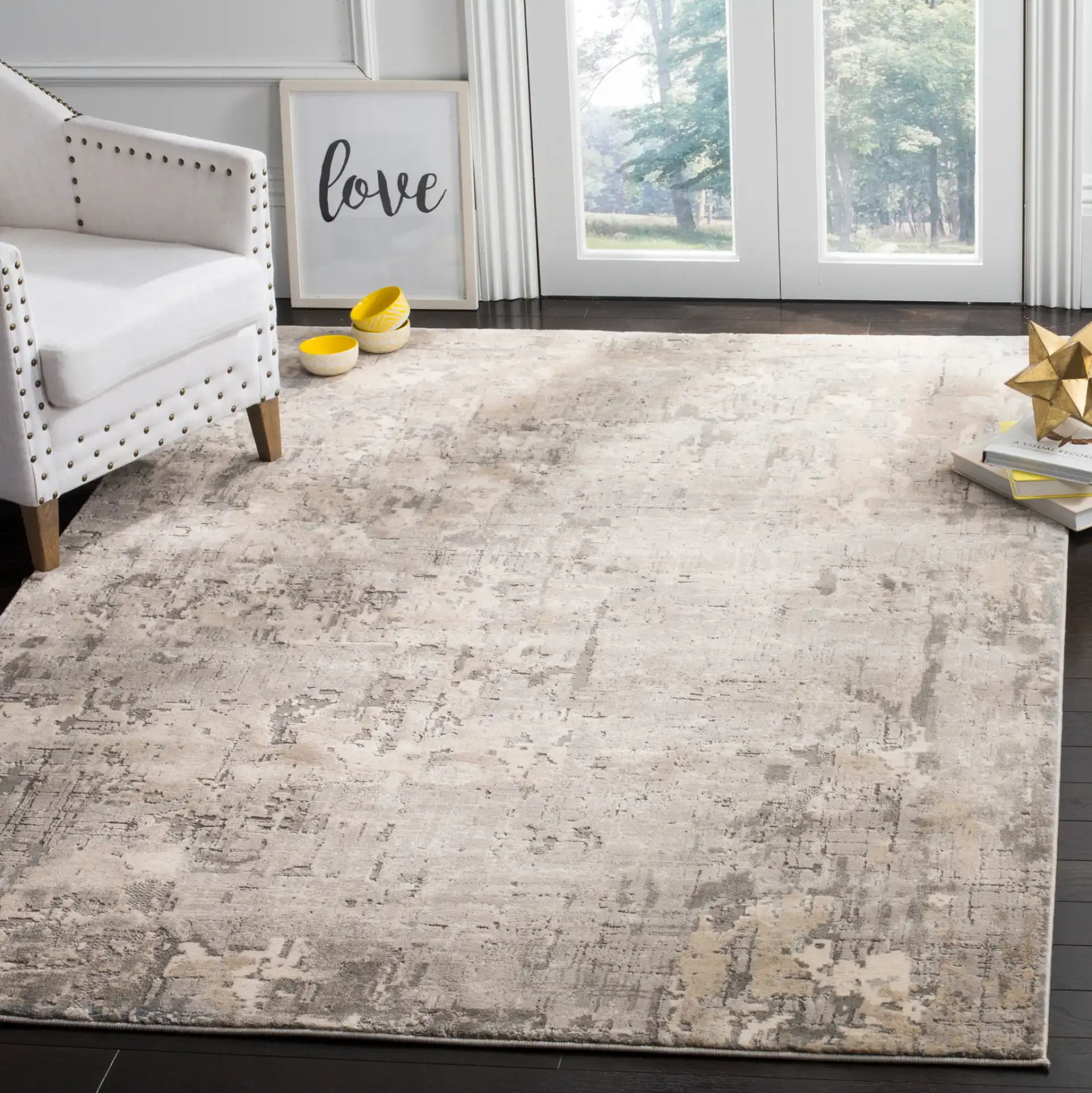 Meadow Abstract Textured Grid Rug in Gray in a styled room