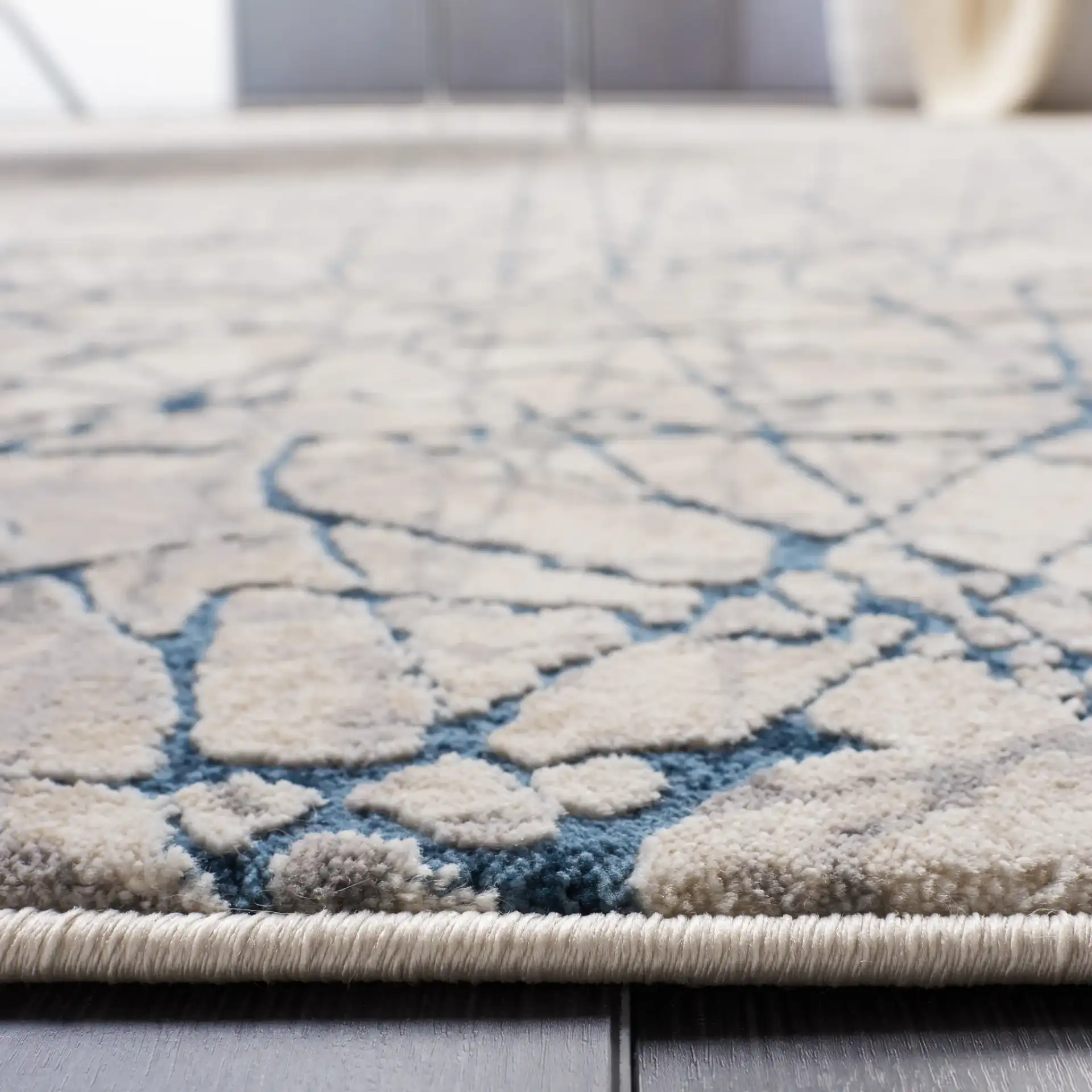Meadow Intersecting Lines Rug in Navy / Ivory in a styled room