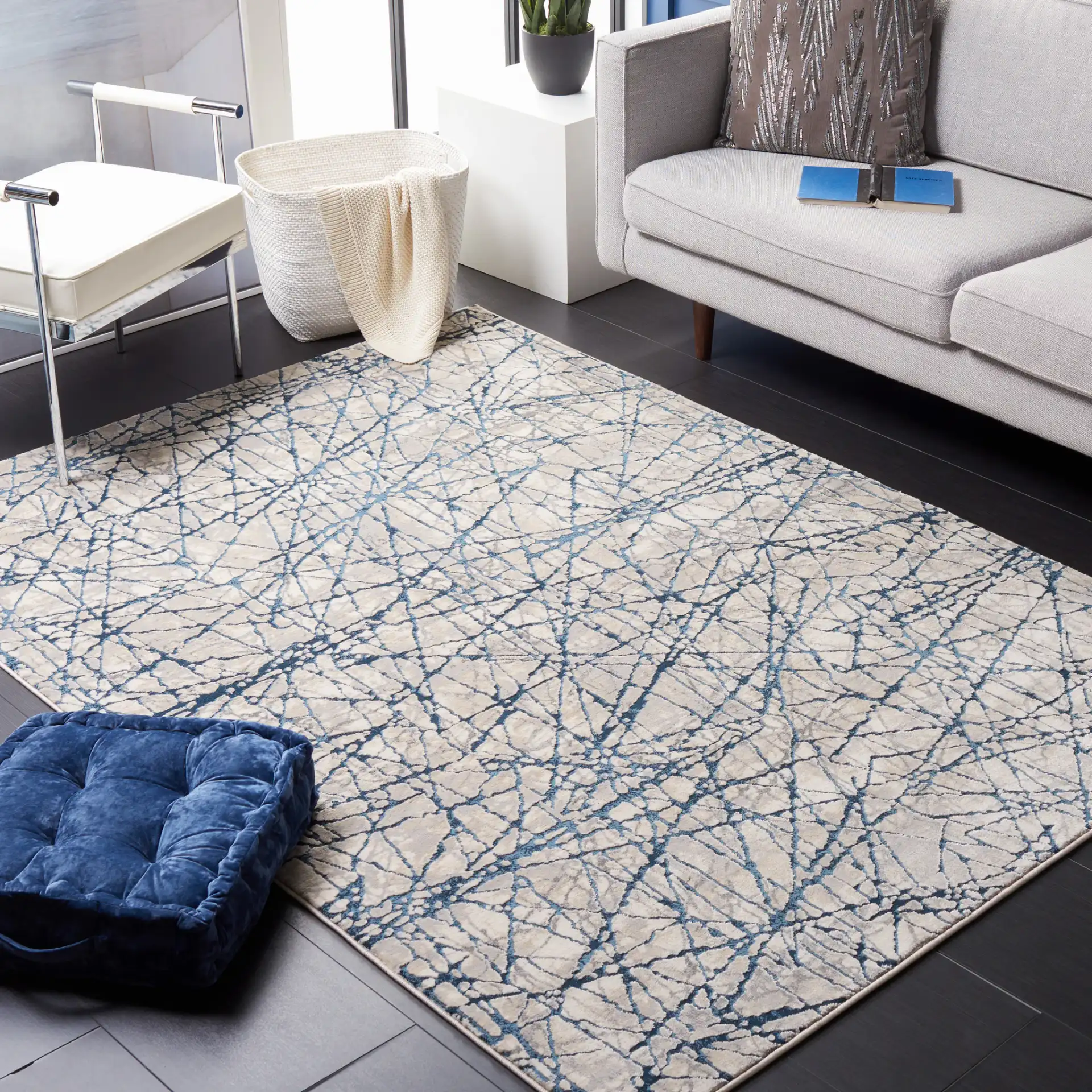 Meadow Intersecting Lines Rug in Navy / Ivory in a styled room