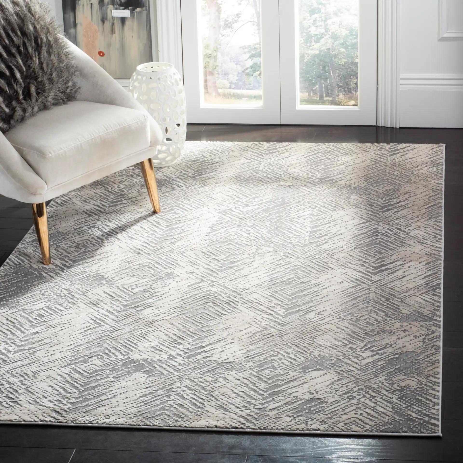Meadow Distressed Diamond Rug in Ivory / Gray in a styled room