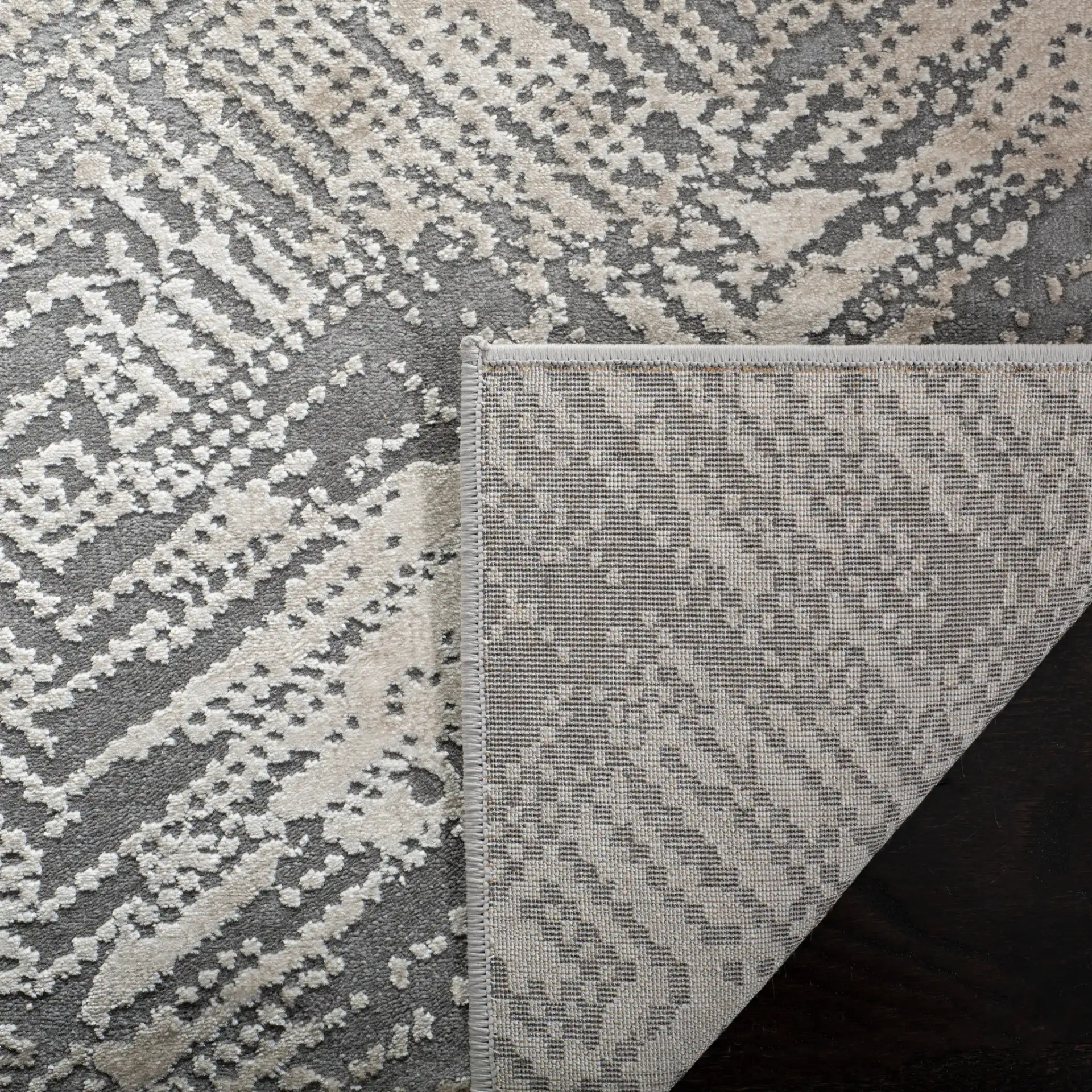 Meadow Distressed Diamond Rug in Ivory / Gray in a styled room