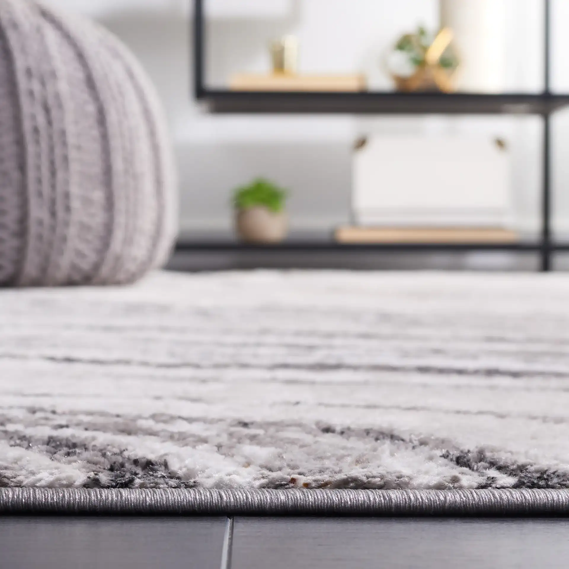 Meadow Marbled Wave Rug in Light Gray / Black in a styled room