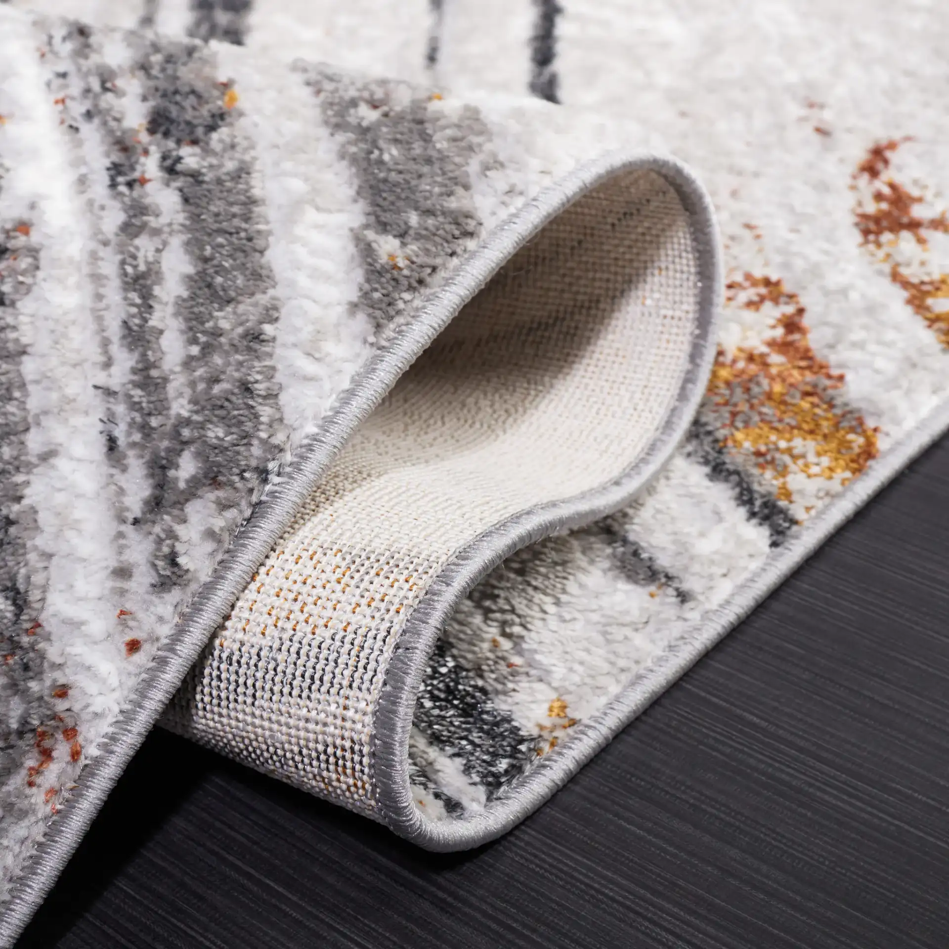Meadow Marbled Wave Rug in Light Gray / Black in a styled room