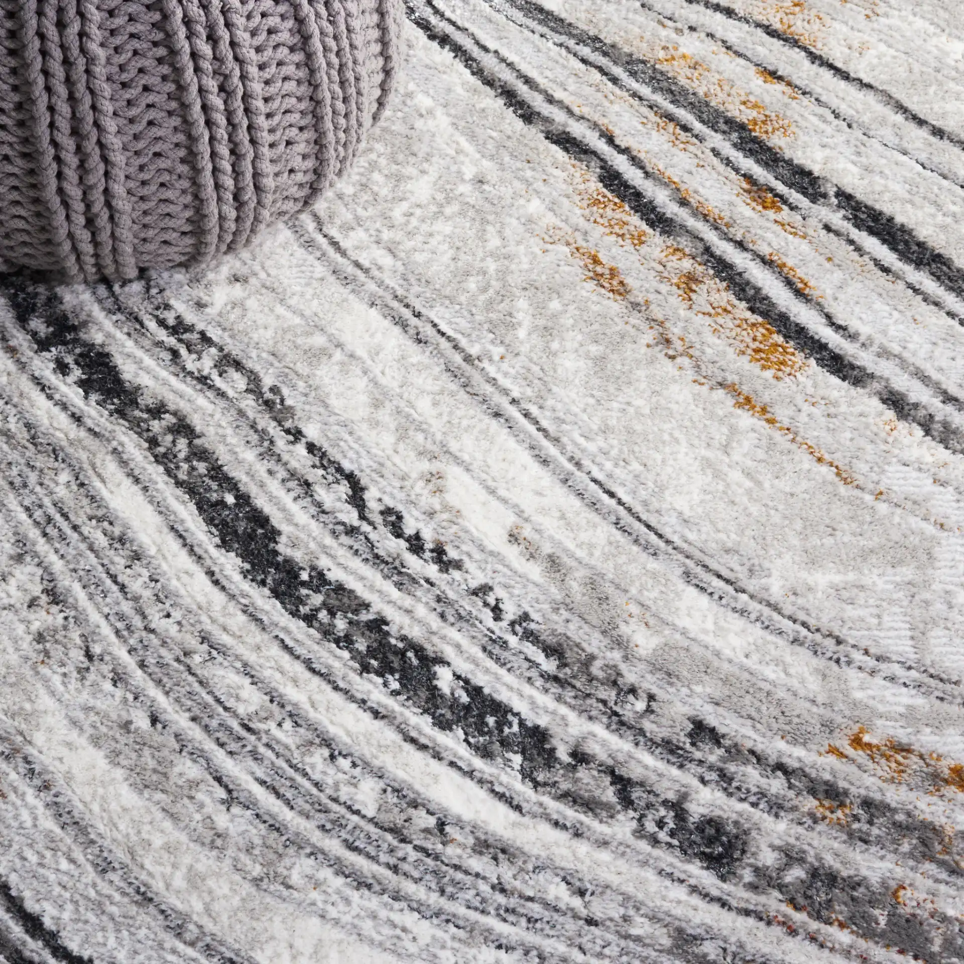 Meadow Marbled Wave Rug in Light Gray / Black in a styled room