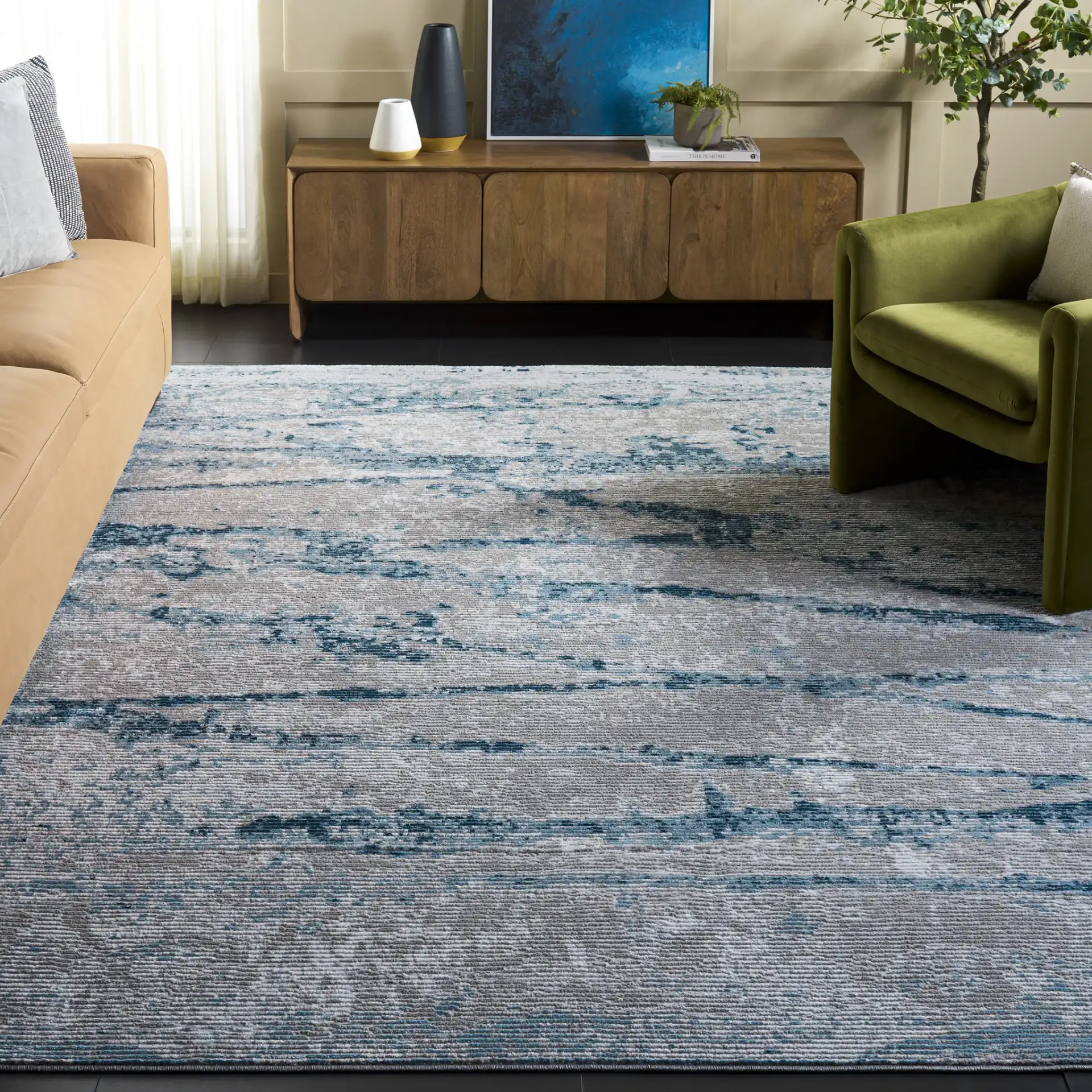 Meadow Abstract Landscape Rug in Light Gray / Blue in a styled room