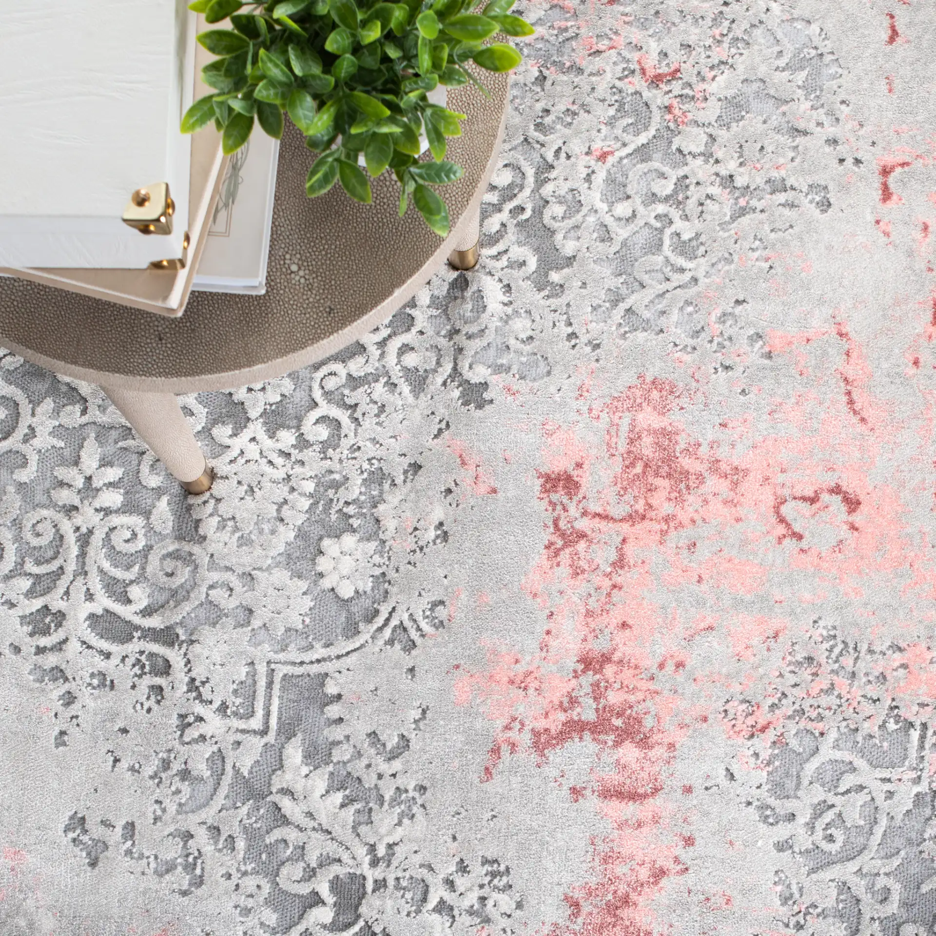 Meadow Distressed Damask Rug in Light Gray / Pink in a styled room