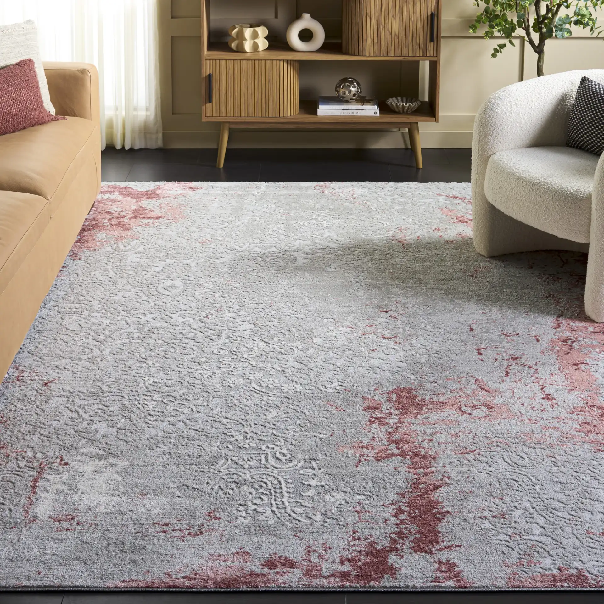 Meadow Distressed Damask Rug in Light Gray / Pink in a styled room