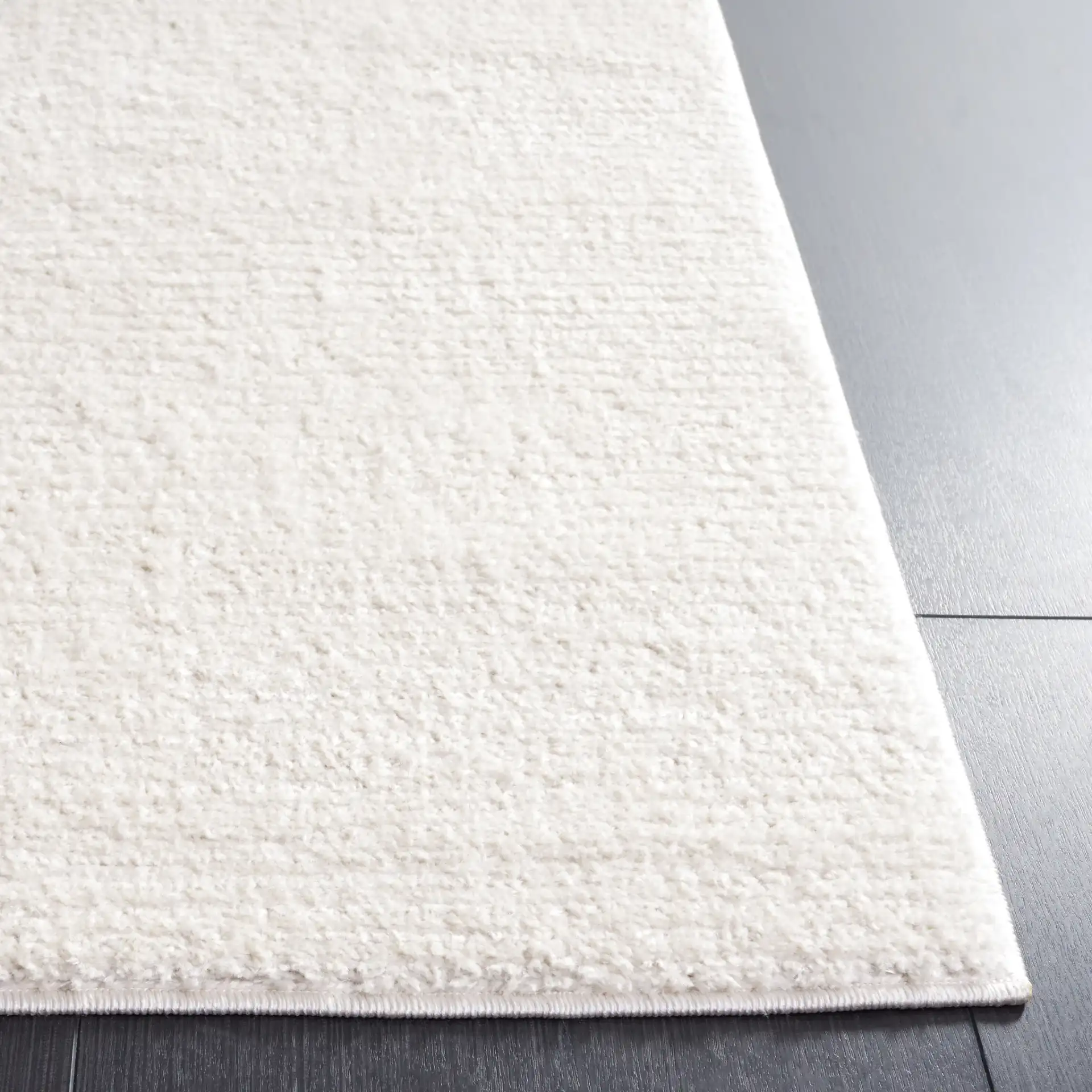 Melody Ribbed Rug in Ivory in a styled room
