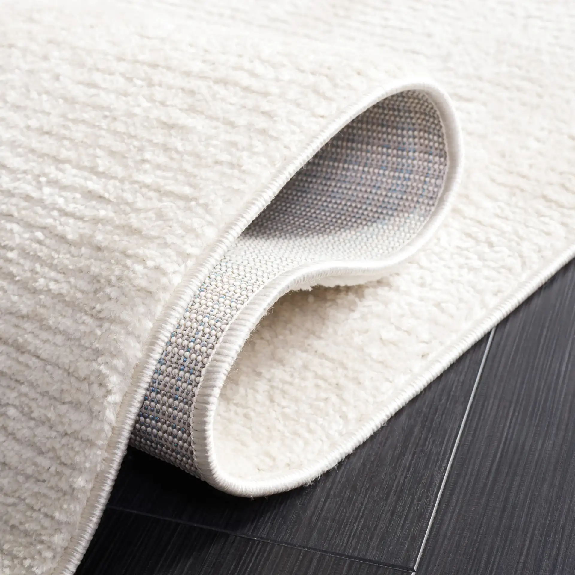 Melody Ribbed Rug in Ivory in a styled room