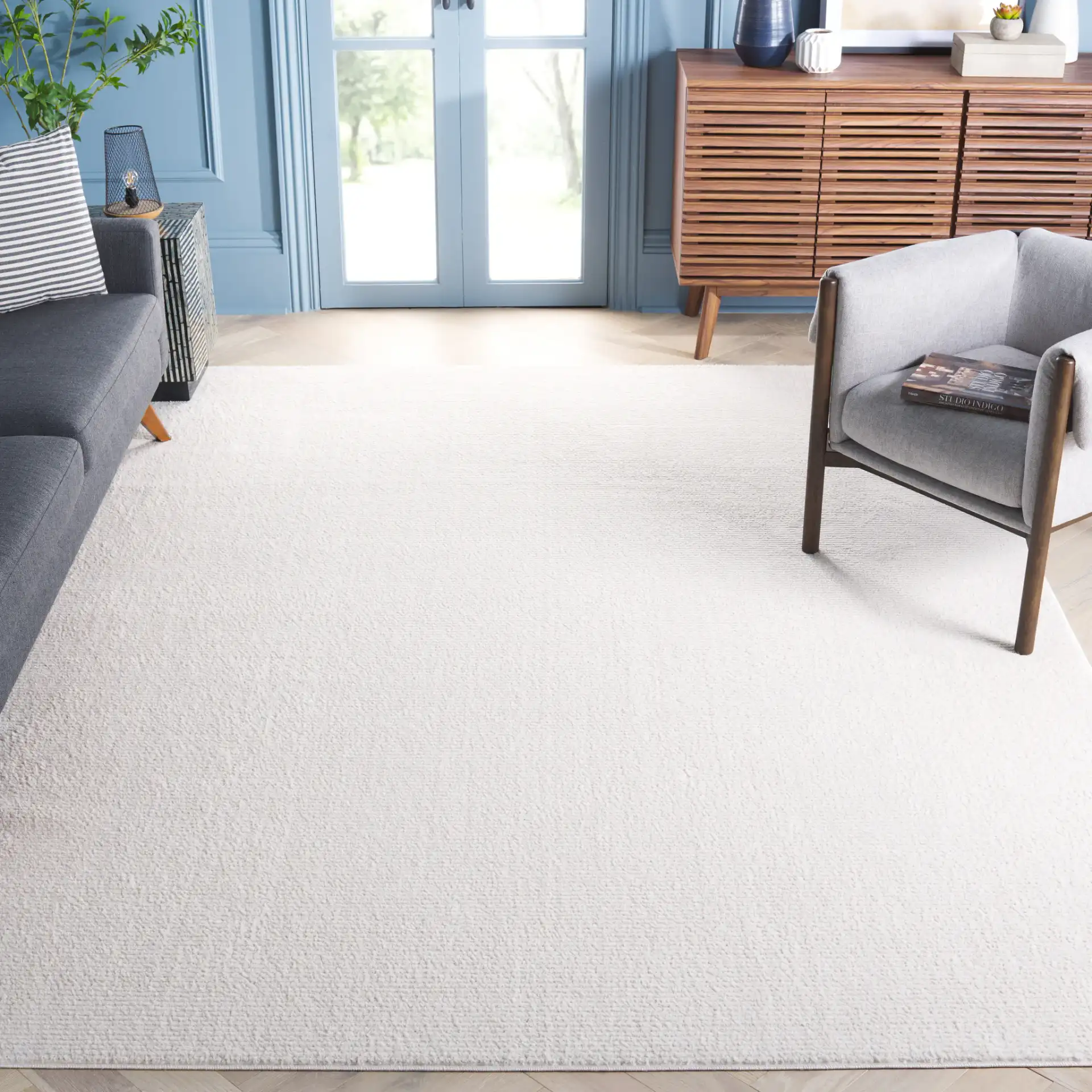 Melody Ribbed Rug in Ivory in a styled room