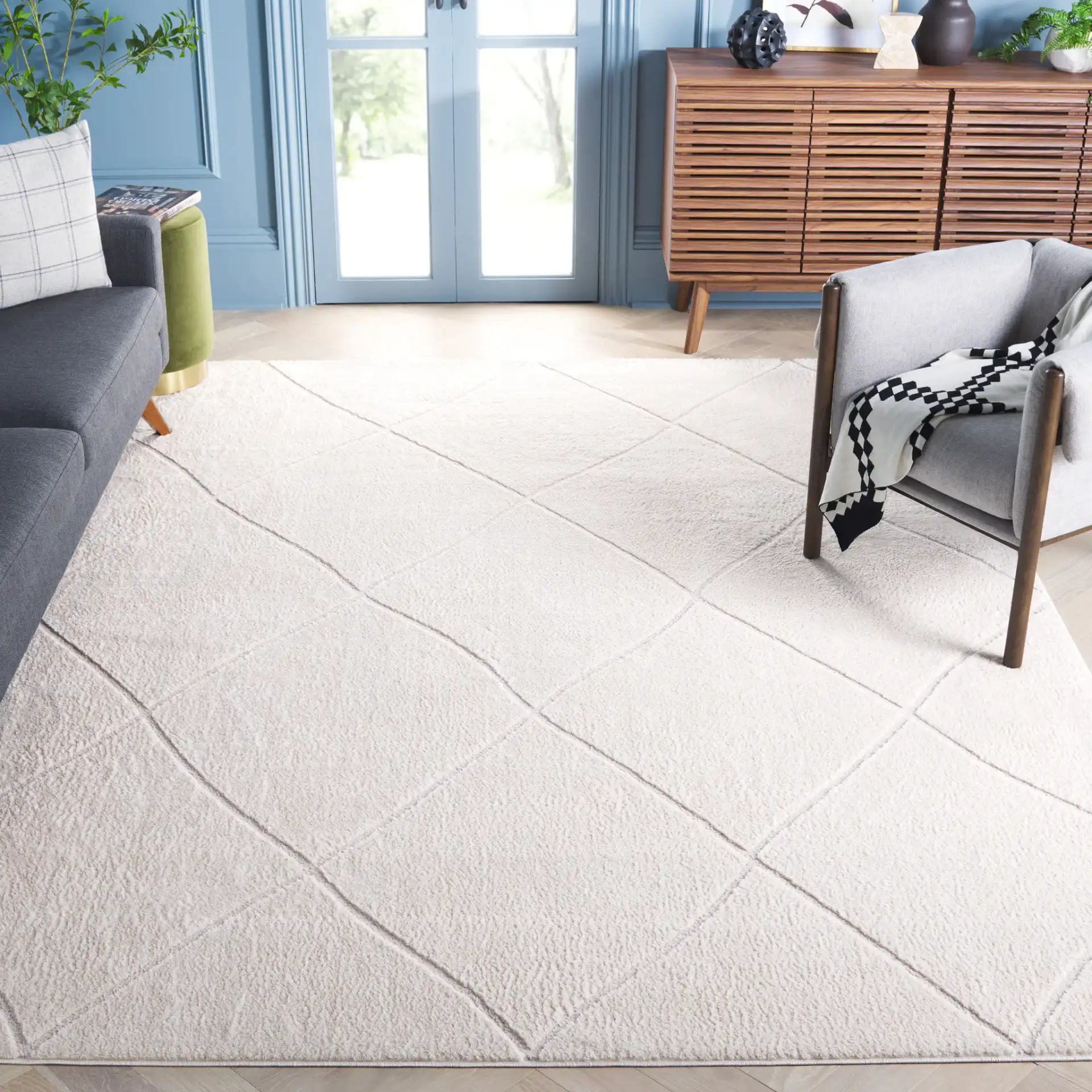 Melody Carved Diamond Rug in Ivory / Beige in a styled room
