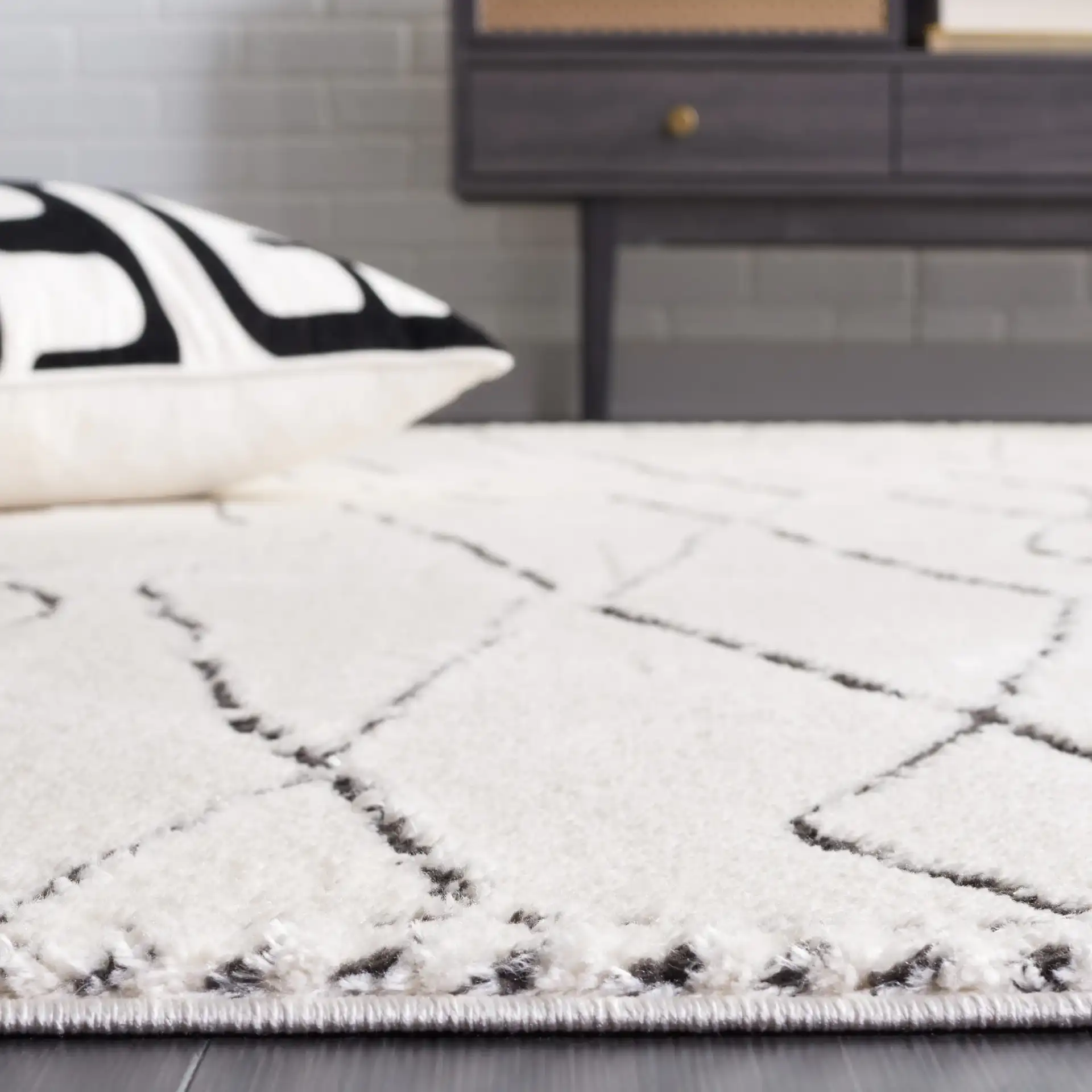 Melody Tulum Diamond Rug in Ivory / Black in a styled room