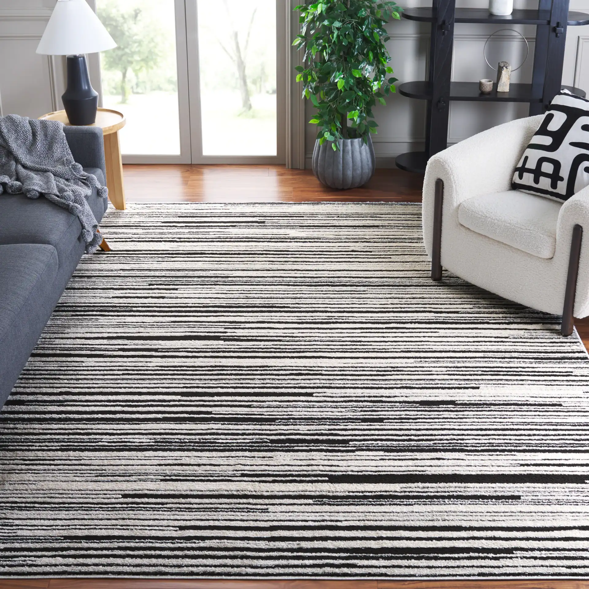 Melody Modern Linear Stripe Rug in Ivory / Black in a styled room